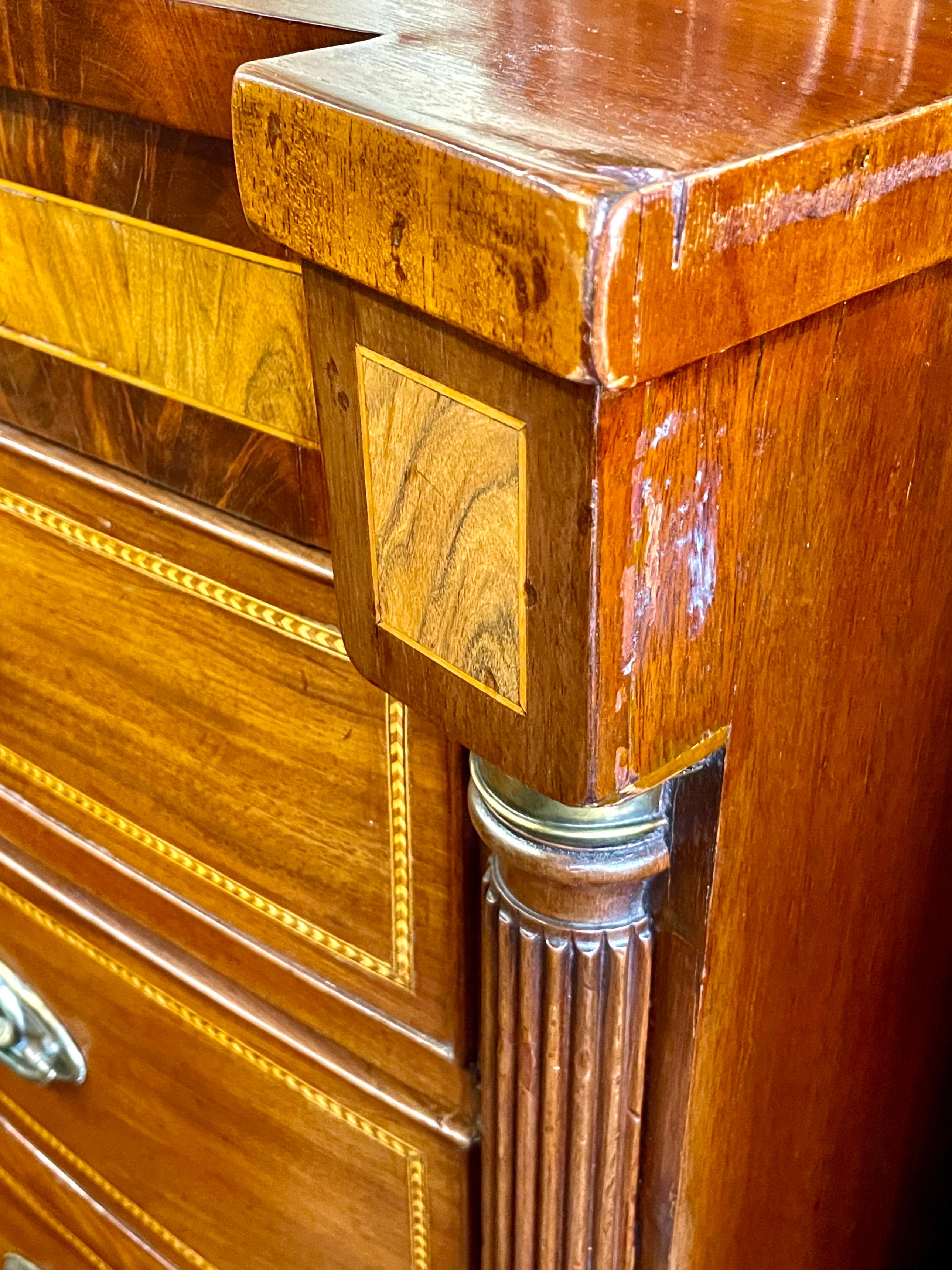 Hand-Crafted Rare early 19th century American Late Empire inlaid mahogany Bowfront Chest For Sale