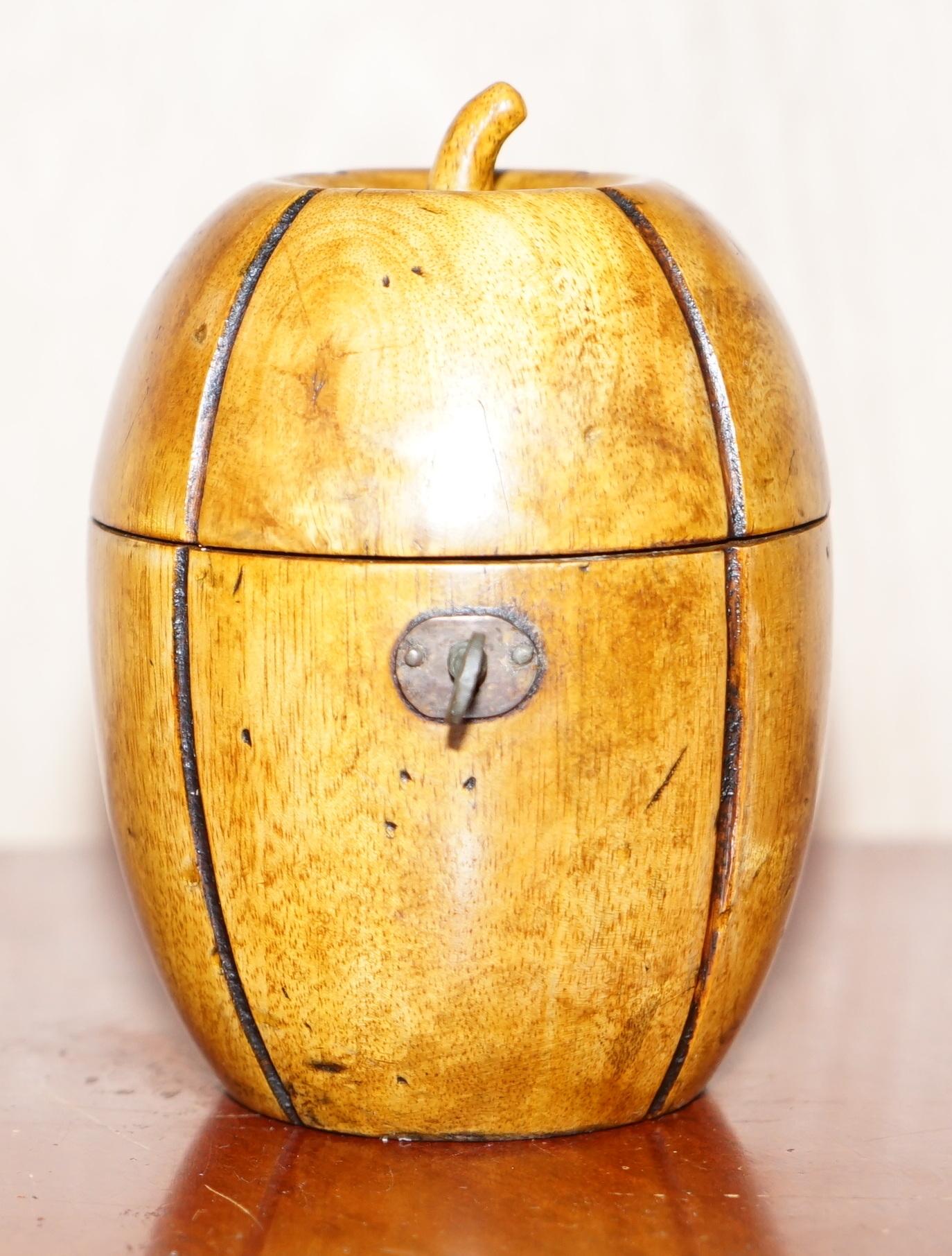 We are delighted to offer for sale this lovely early 19th century Treen carved wood apple tea caddy with original key

A highly collectable and decorative tea caddy, some of these retail for £3000-£5000, just look on 1stdibs and you will see