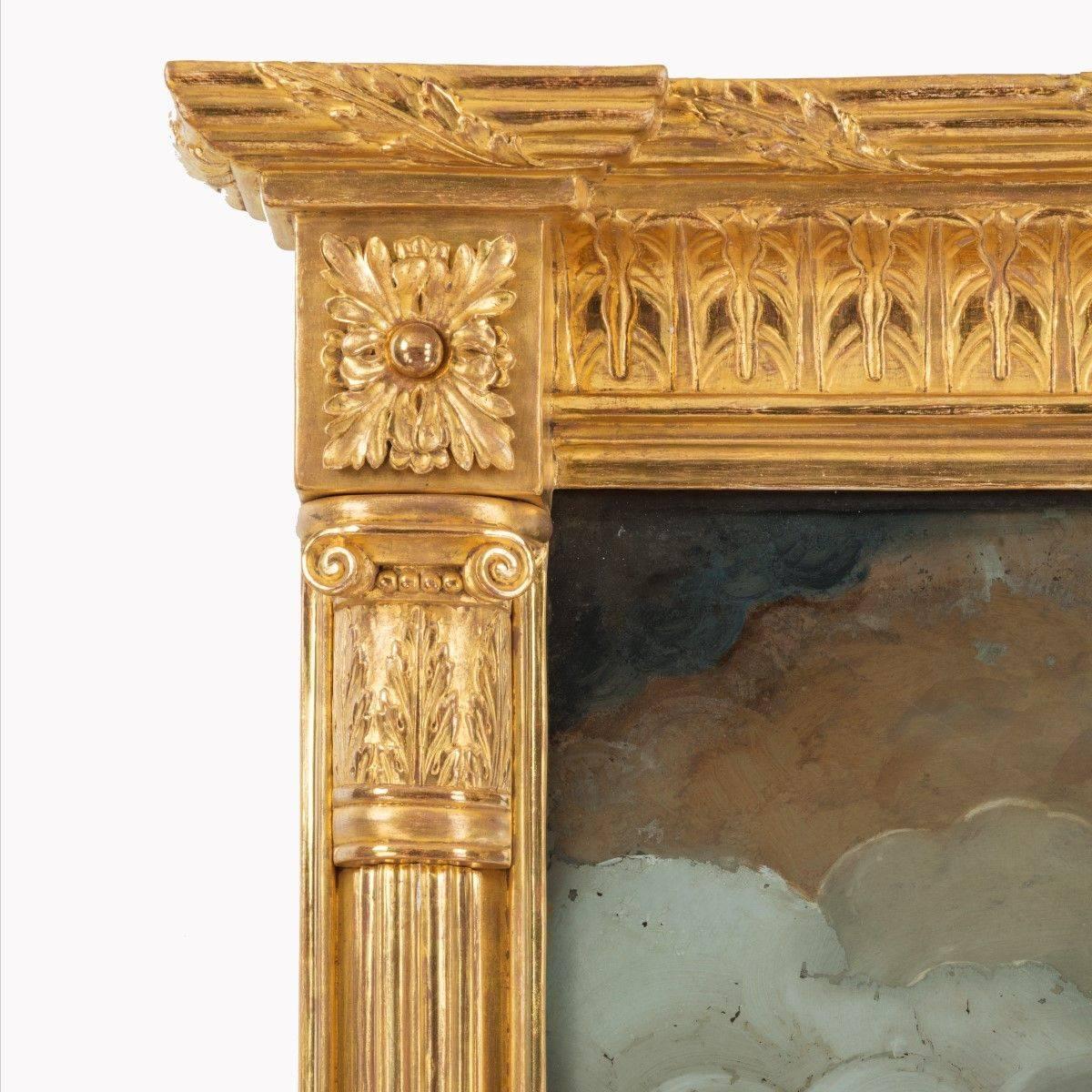This pier glass is of narrow rectangular form comprising three panels within acanthus capped gilt wood columns. 

The upper panel with a reverse-glass painting of a naval battle, probably the Battle of the Nile. The lower panel showing a