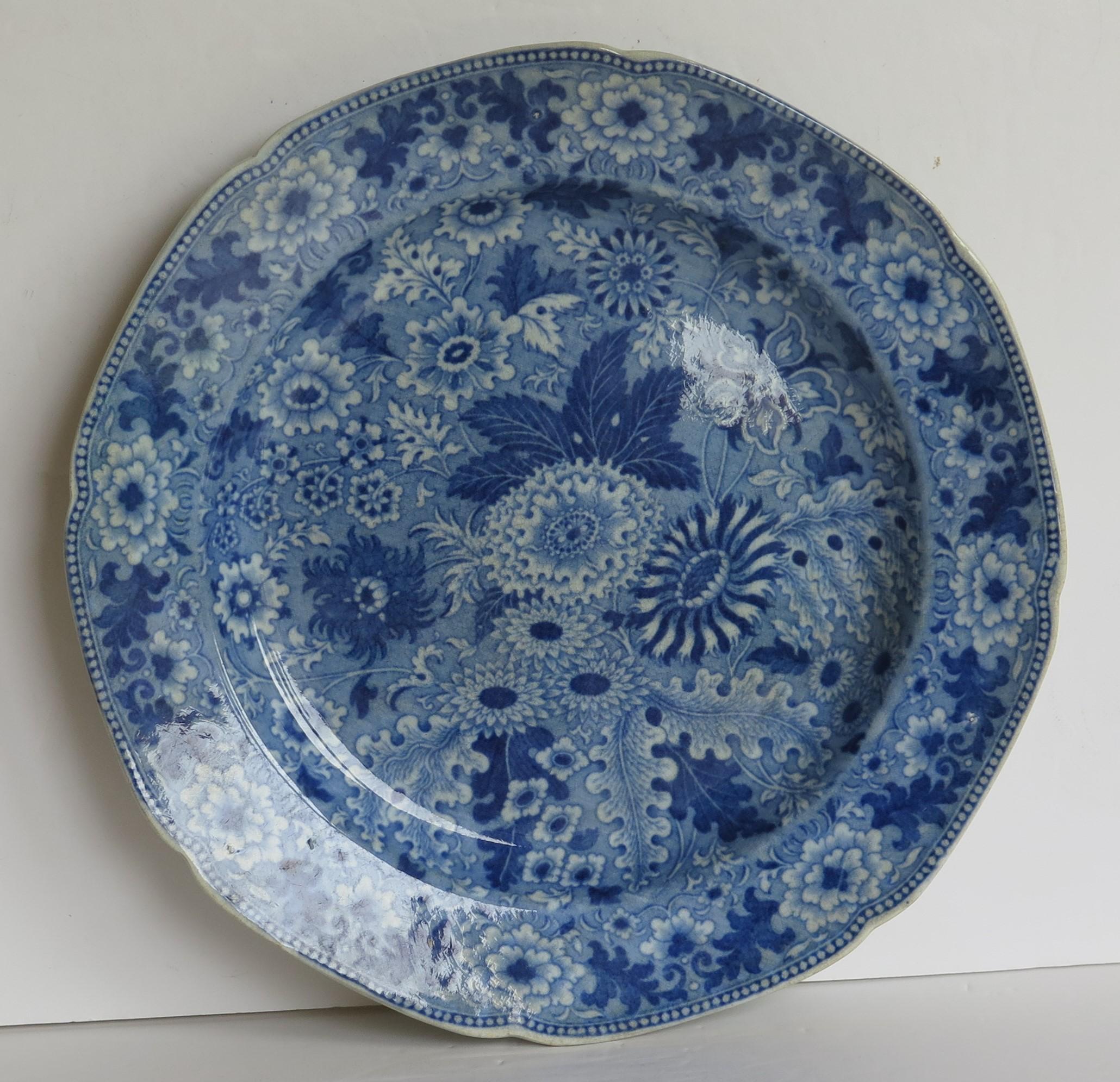 This is a beautiful early plate in a printed blue and white floral pattern and made of a type of earthenware pottery called pearlware, in the very early 19th century, by Henshall & Co., of Longport, Staffordshire Potteries, circa 1810.

Pieces by