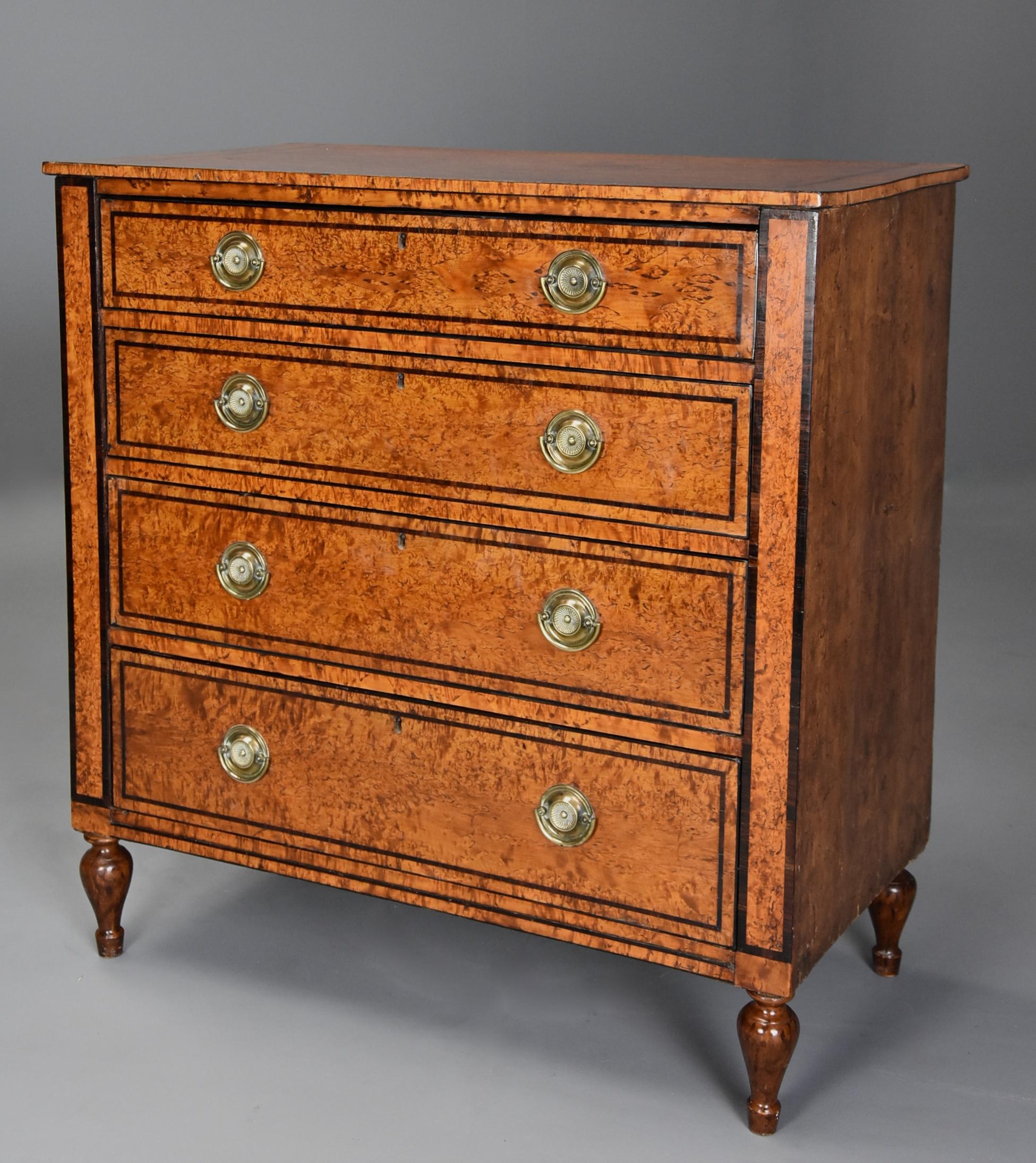 An extremely rare early 19th century Regency (circa 1820) period Karelian birch (or Masur birch) chest of drawers of good patina (color).

This chest of drawers consists of a Karelian birch veneered top with mahogany banding and outer birch cross