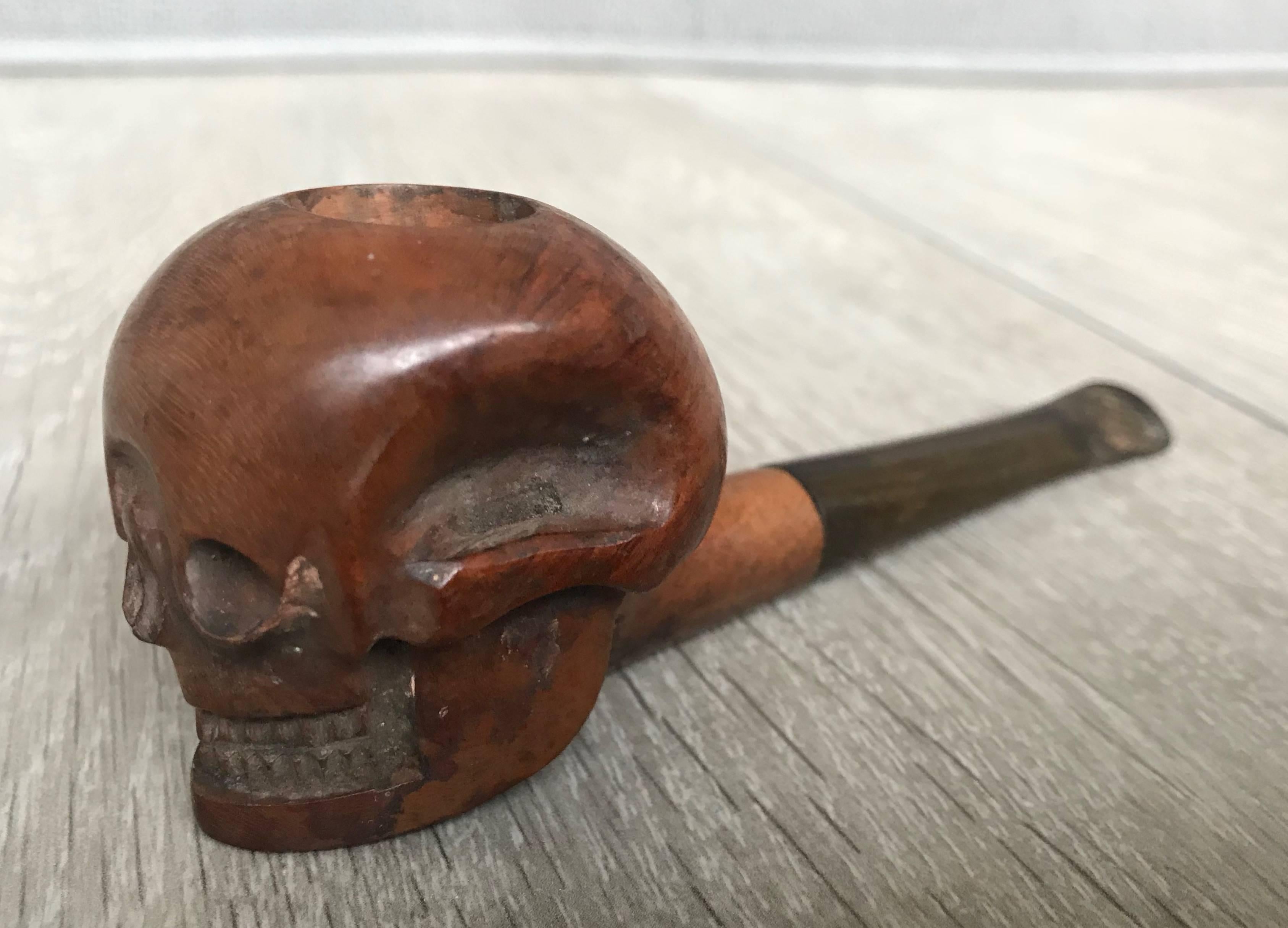 Folk Art pipe that will turn some heads.

This out of the ordinary antique pipe is a real eye catcher. The hand-carved, solid burl walnut skull has the most beautiful patina and it actually is very comfortable to hold in your hand. Thanks to the