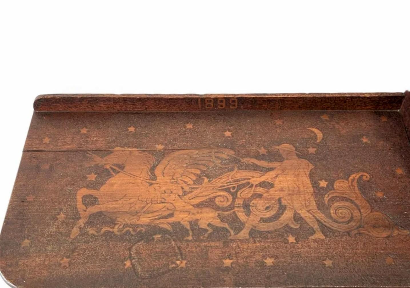 A rare, one-of-a-kind antique American folk decorated desk with beautifully aged distressed patina found in Mt. Juliet, Tennessee. 

Hand-crafted in the Southern United States in the late 19th century, featuring elaborate hand carving and pyrography