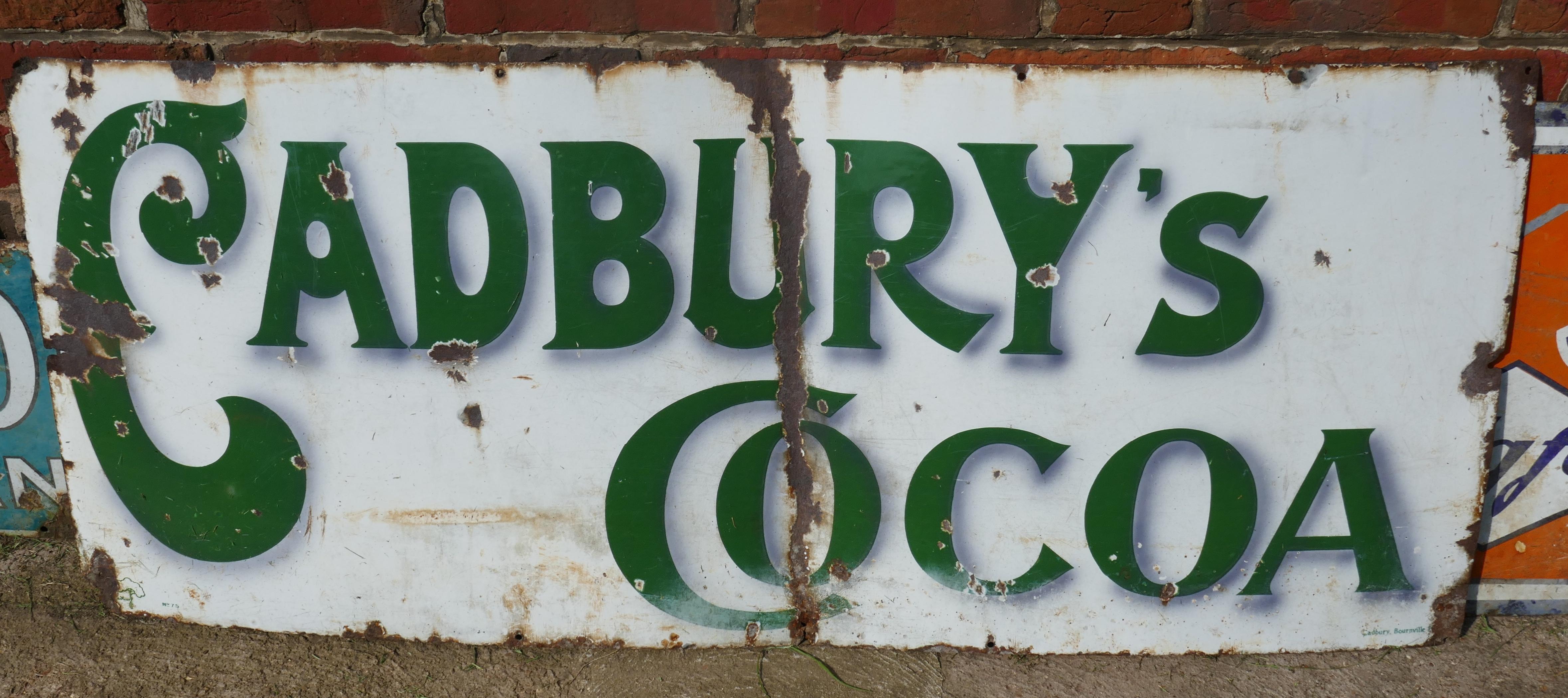 Rare early Cadbury’s Cocoa enamel sign 

Very rare old sign, this is one of the earliest Cadbury signs, it has green writing on a white background, it is made in ceramic enamel

The sign has had a rough life, it looks like someone has tried to