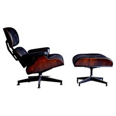 Rare early Charles & Ray Eames Lounge Chair 670 & 671 in outstanding rosewood