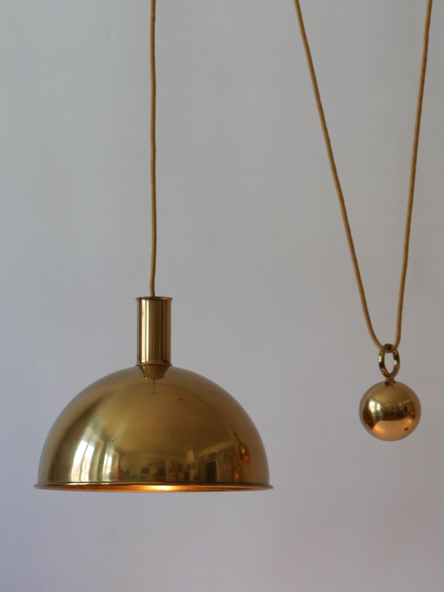 Rare Early Double Solid Brass Counterweight Pendant Lamp by Florian Schulz 1960s In Good Condition In Munich, DE