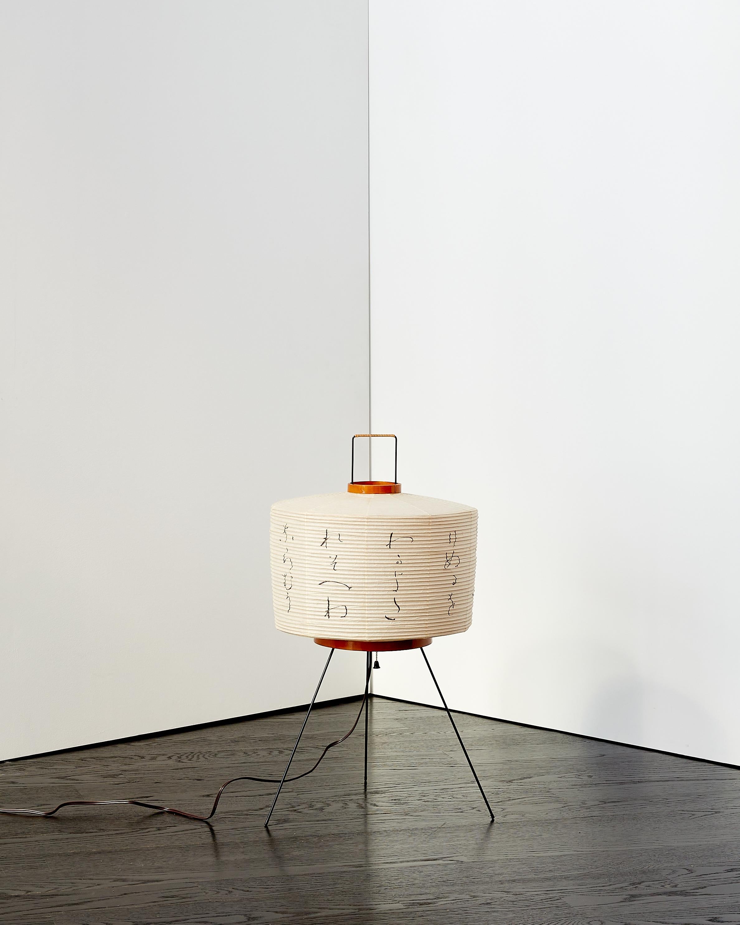Rare and early Isamu Noguchi Akari light sculpture with screen-printed kanji patterns. Model 6A.

Early model, marked with iconic red sun and moon ideogram.

Hand-made form by Ozeki & Co. Ltd., Gifu, Japan.

Noguchi started his Akari series in