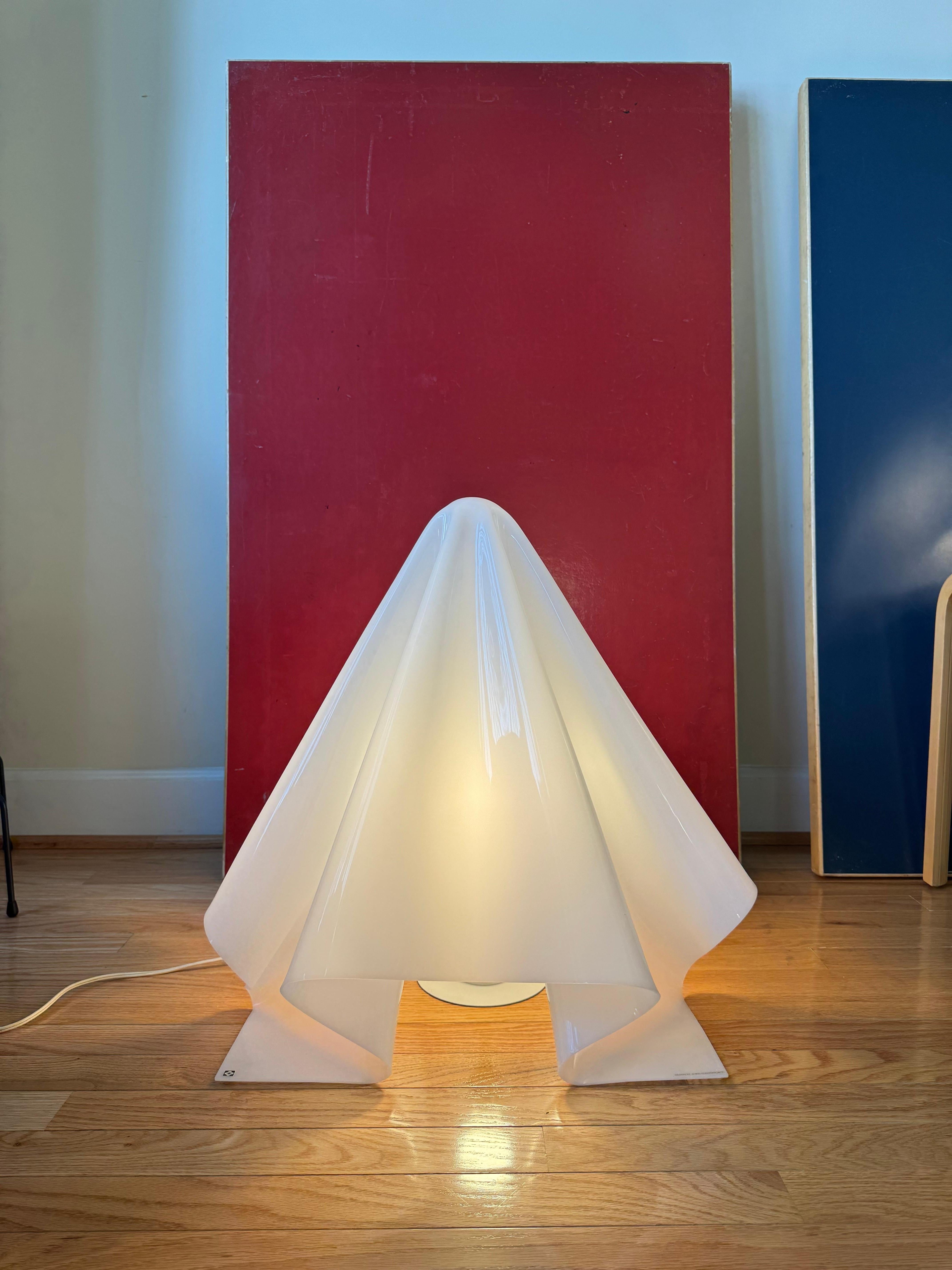 This masterpiece, K-series or another name Oba- Q, epitomizes Japanese post-modernism designed in 1972 by Shiro Kuramata, the Japanese legendary interior designer.

Another name Oba Q was given because the shade shapes like a lovingly popular ghost