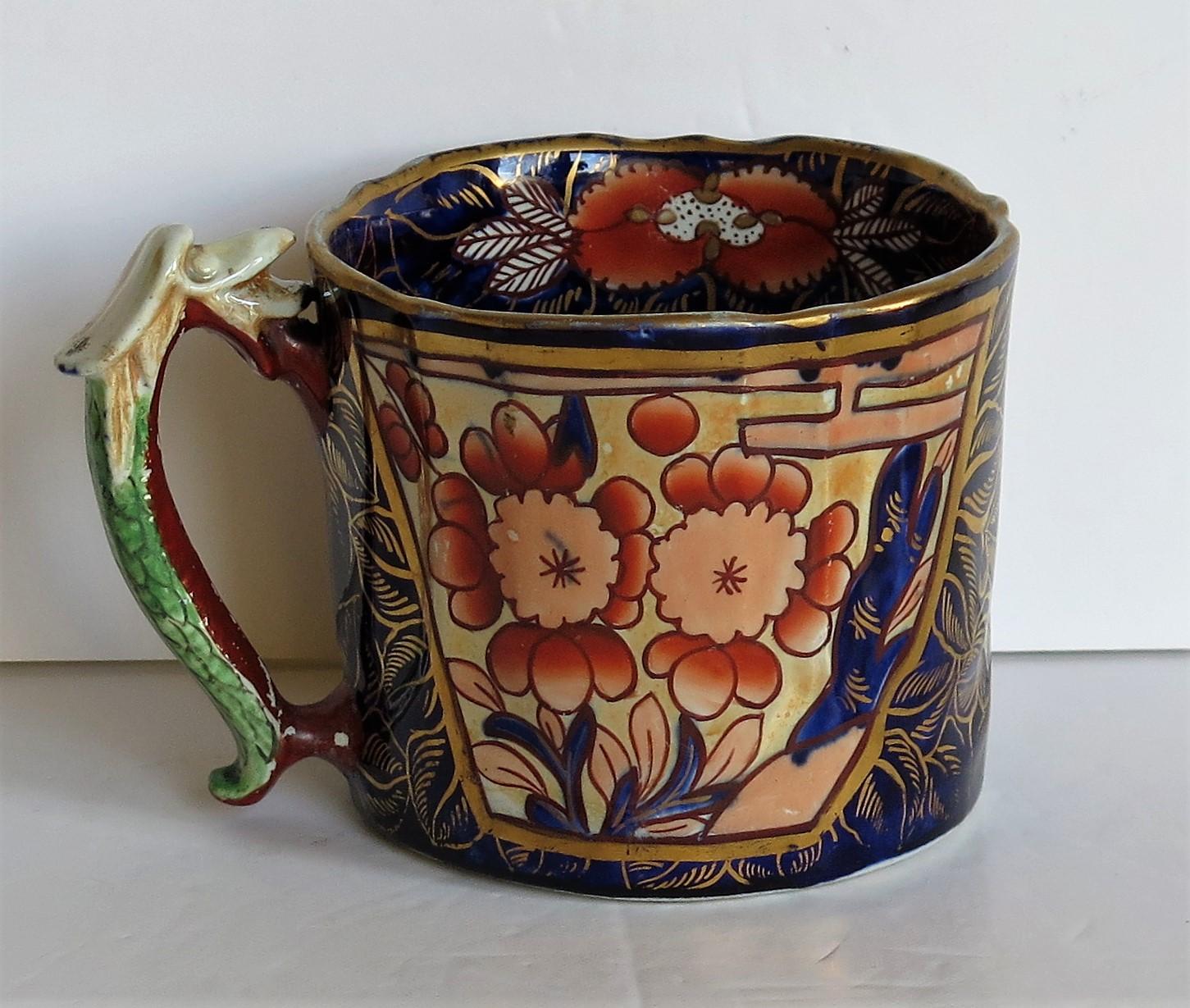 This is a rare, Ironstone pottery large mug in the School House pattern, made by Mason's Ironstone, of Lane Delph, Staffordshire, England, circa 1818

Mason's ironstone mugs are rare, particularly in this very desirable pattern. This mug is large