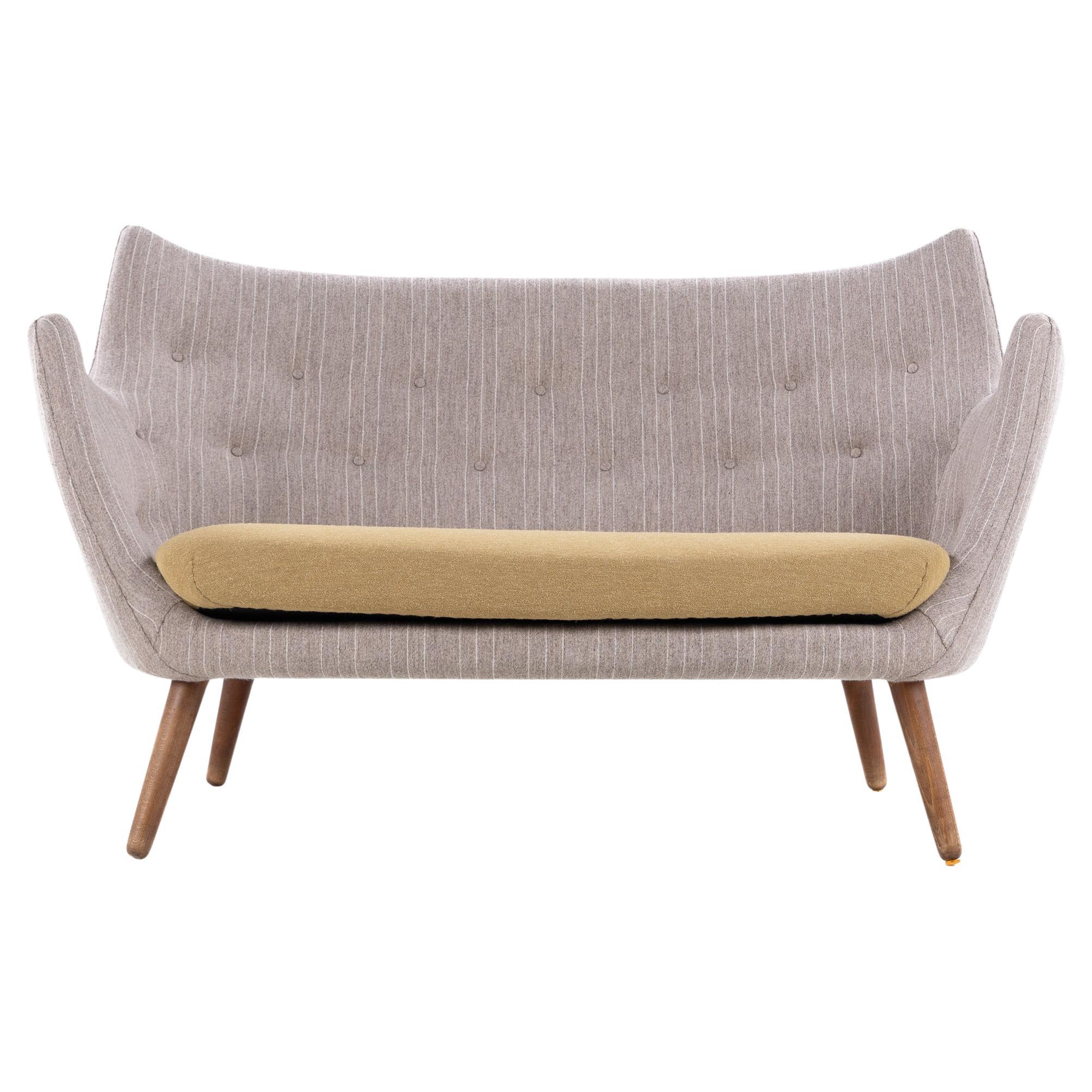 Rare early model 'The Poet’ sofa by Finn Juhl