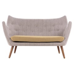 Rare early model 'The Poet’ sofa by Finn Juhl