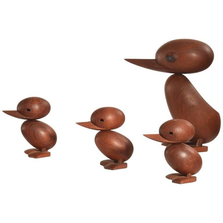 Introducing a truly unique and rare set of early production Hans Bølling Duck and Ducklings. This set of four playful, yet sophisticated figures is the perfect addition to any modern or vintage-inspired space. 

Hans Bølling's iconic Duck and