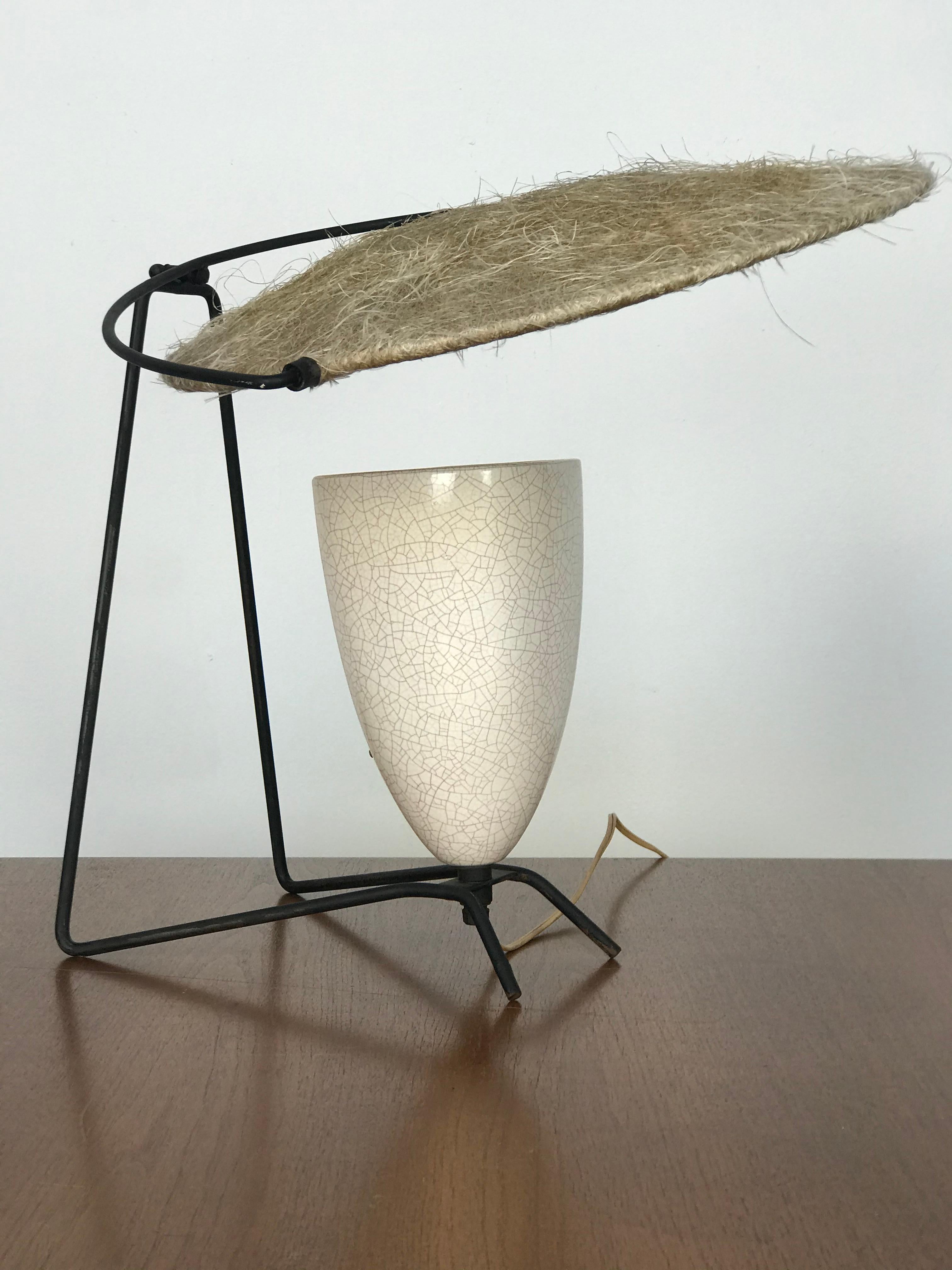 Rare early model desk/table lamp by Mitchell Bobrick for Controlight. Designed in 1945. The Bobrick lamps with these early iron legs and book-rests are hard to find. A book can be rested against the iron base. This one is in very nice original