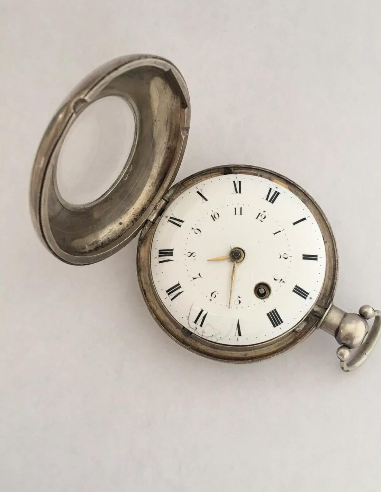
Rare Early Verge Fusee Silver Half Hunter Cased London Maker Pocket Watch.
This watch is in good working condition and is ticking well. But I cannot guarantee the time accuracy. Some visible cracks on the enamel dial as seen in photos.