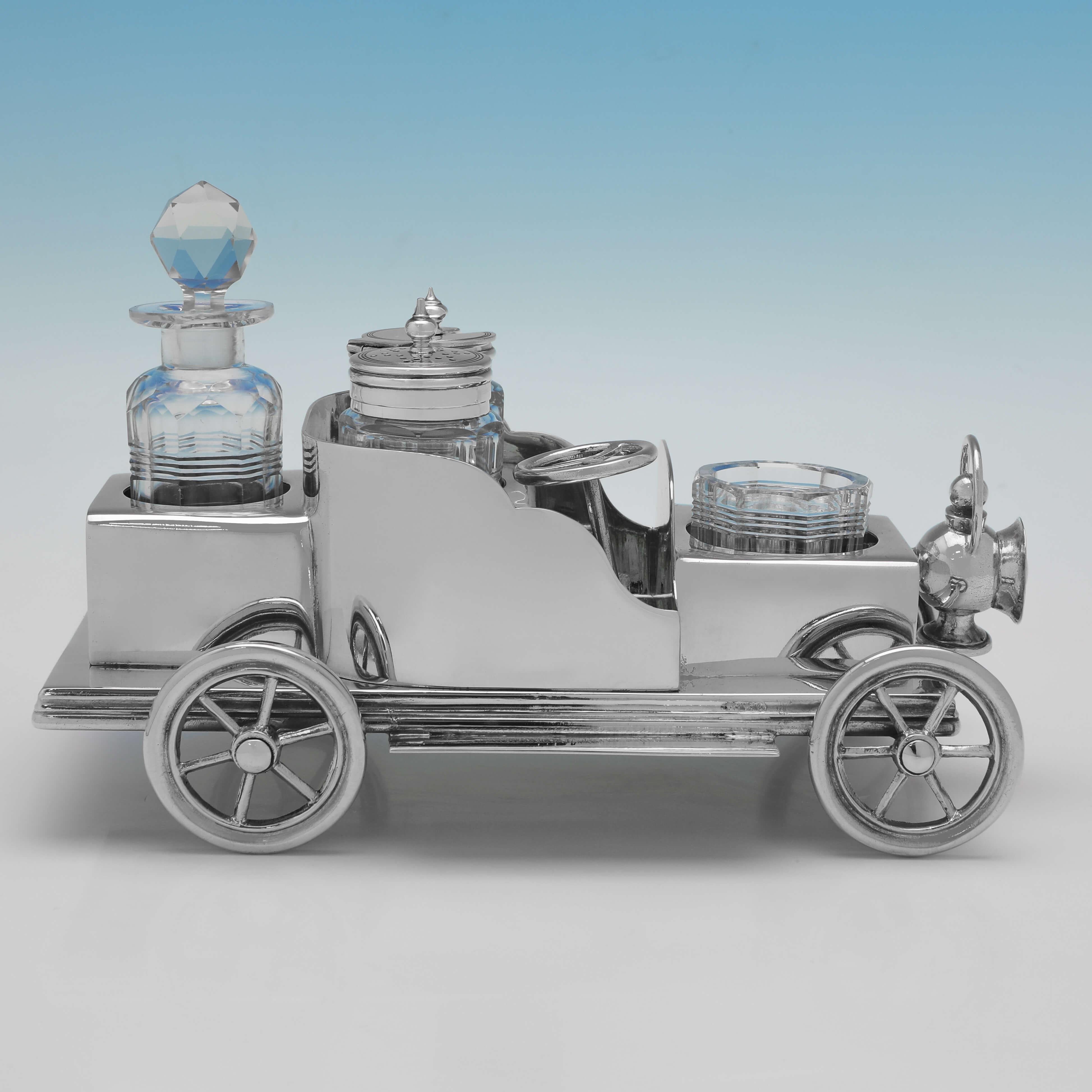 Carrying old silver plate marks for 1905 by Frank Cobb & Co., this charming, Antique, Silver Plate Condiment Set, is in the form of a car, and features 5 containers for various condiments. The condiment set measures 4.75