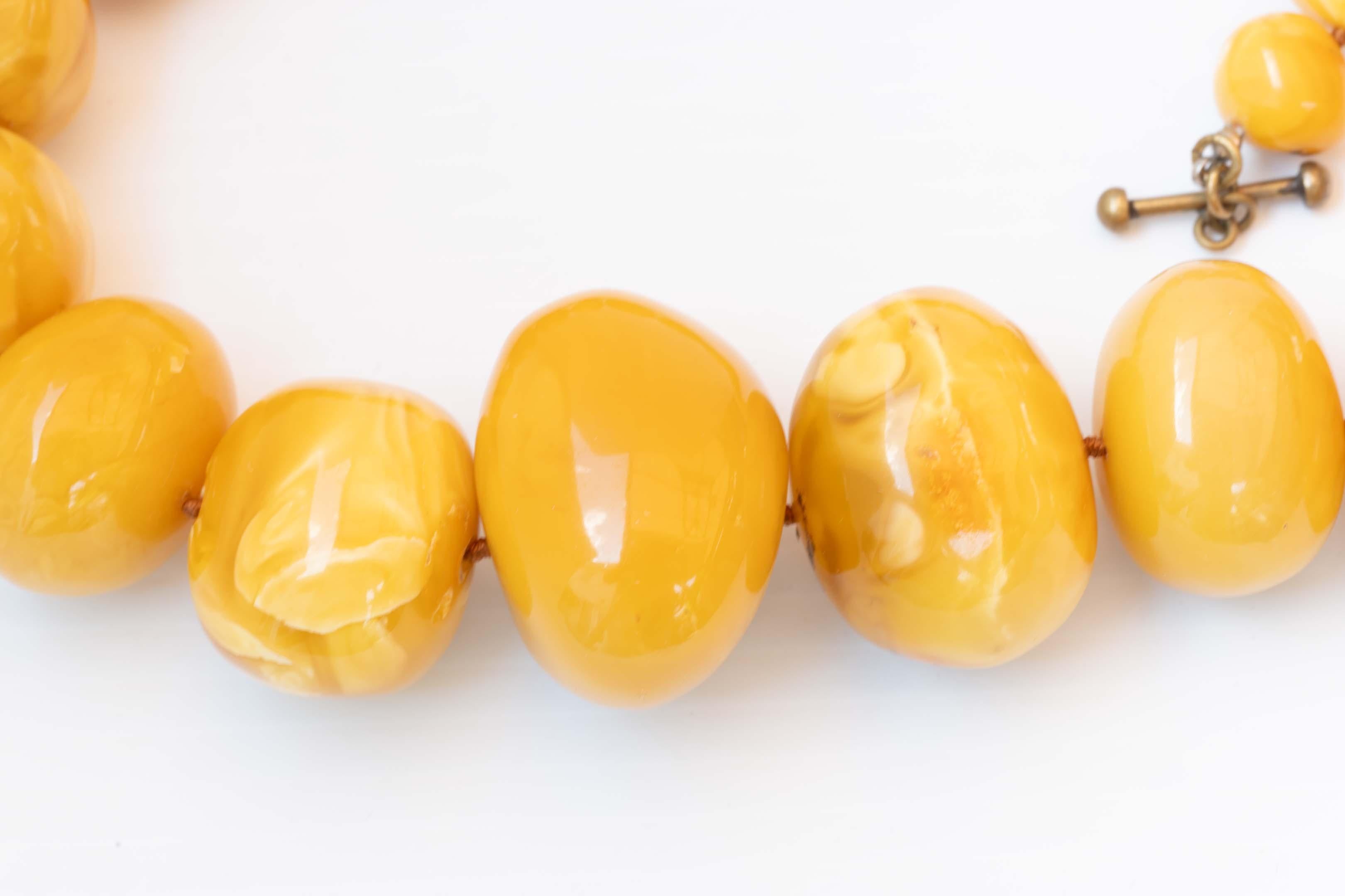 Women's Rare Egg Yolk Baltic 237 gram with 14.5mm to 42mm beads Amber Necklace For Sale