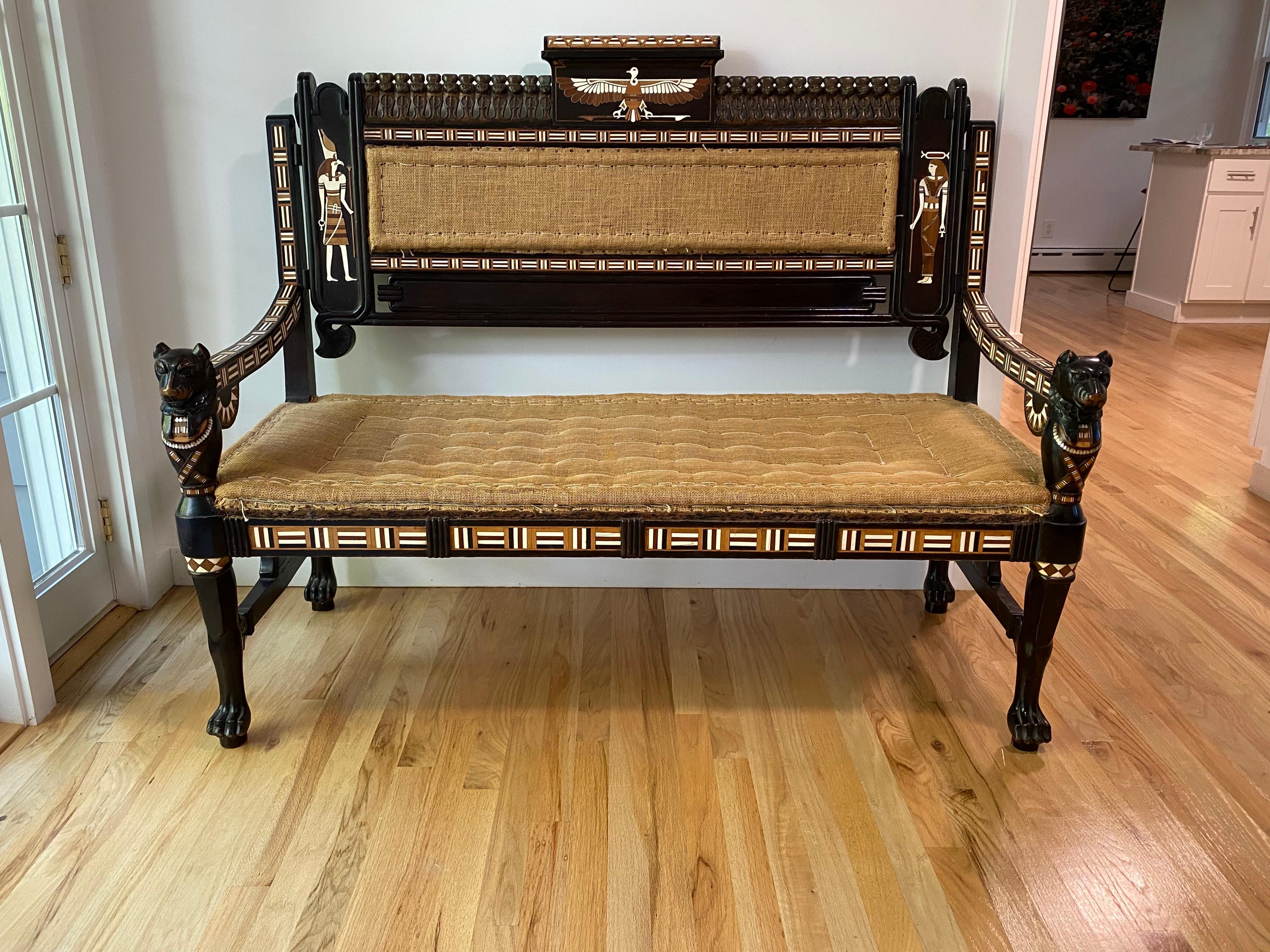 Egyptian Revival ebony and inlaid settee, late 19th century

