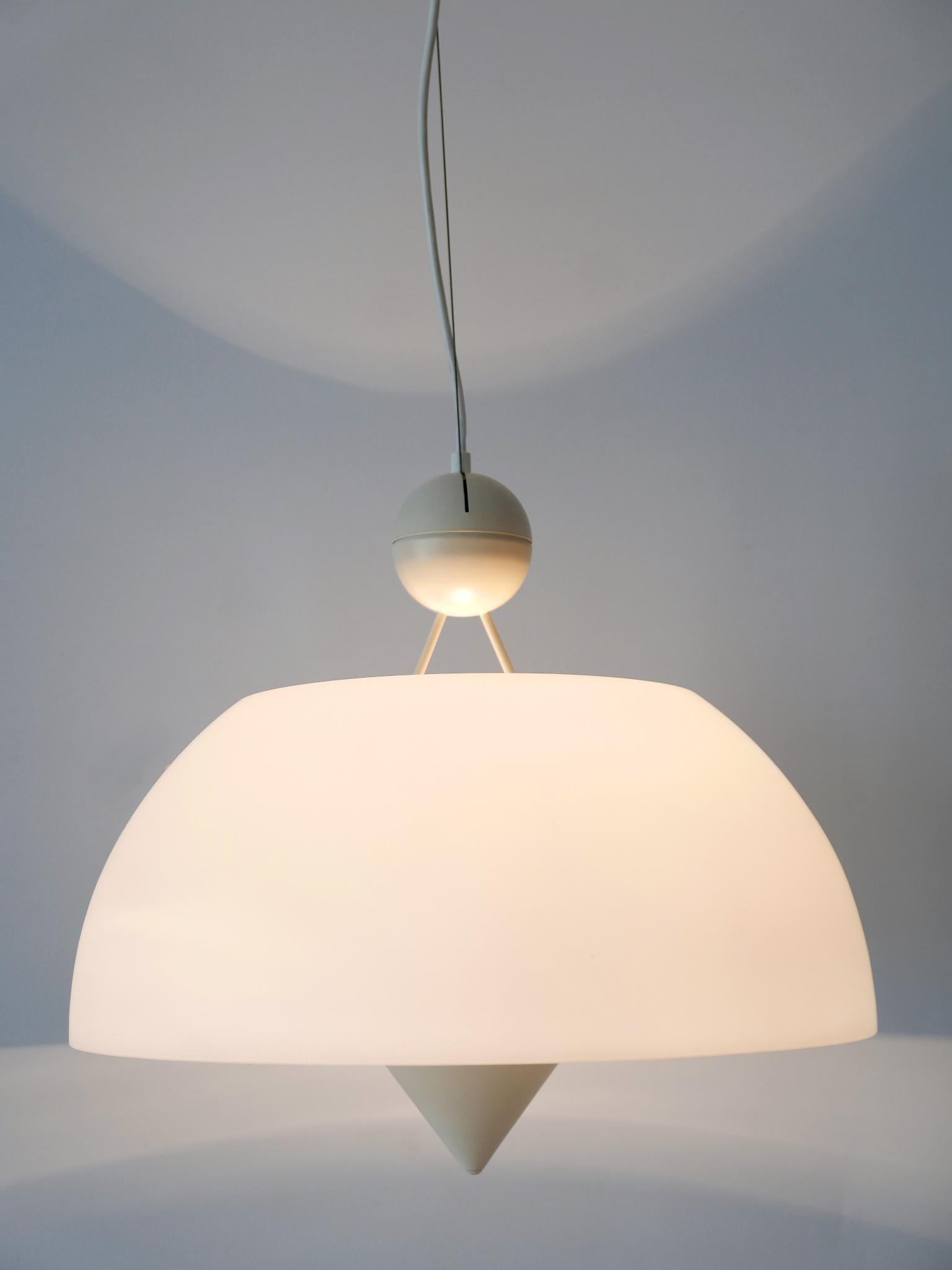 Extremely rare and very elegant Mid-Century Modern pendant lamp or hanging light. Designed probably by Vico Magistretti (attr.) for Oluce (attr.), Italy 1970s

Executed in opaline and metal, the pendant lamp comes with 1 x E27 / E26 Edison screw fit