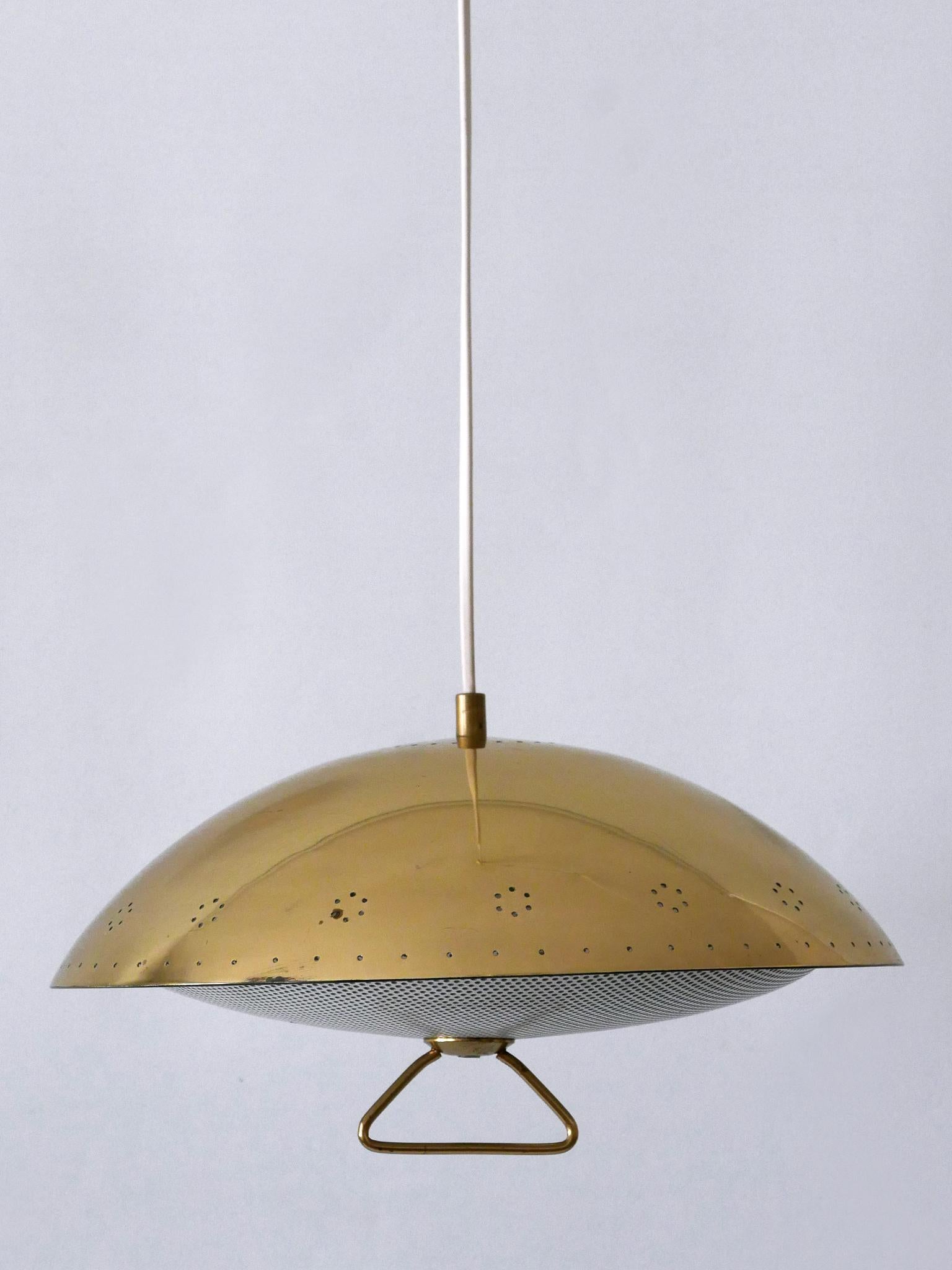 Tedesco Rara ed elegante lampada a sospensione in metallo traforato della metà del secolo scorso, Germania 1950 in vendita