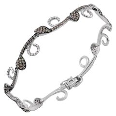 Bracelet élégant et rare en or blanc avec diamants blancs et diamants bruns pour elle