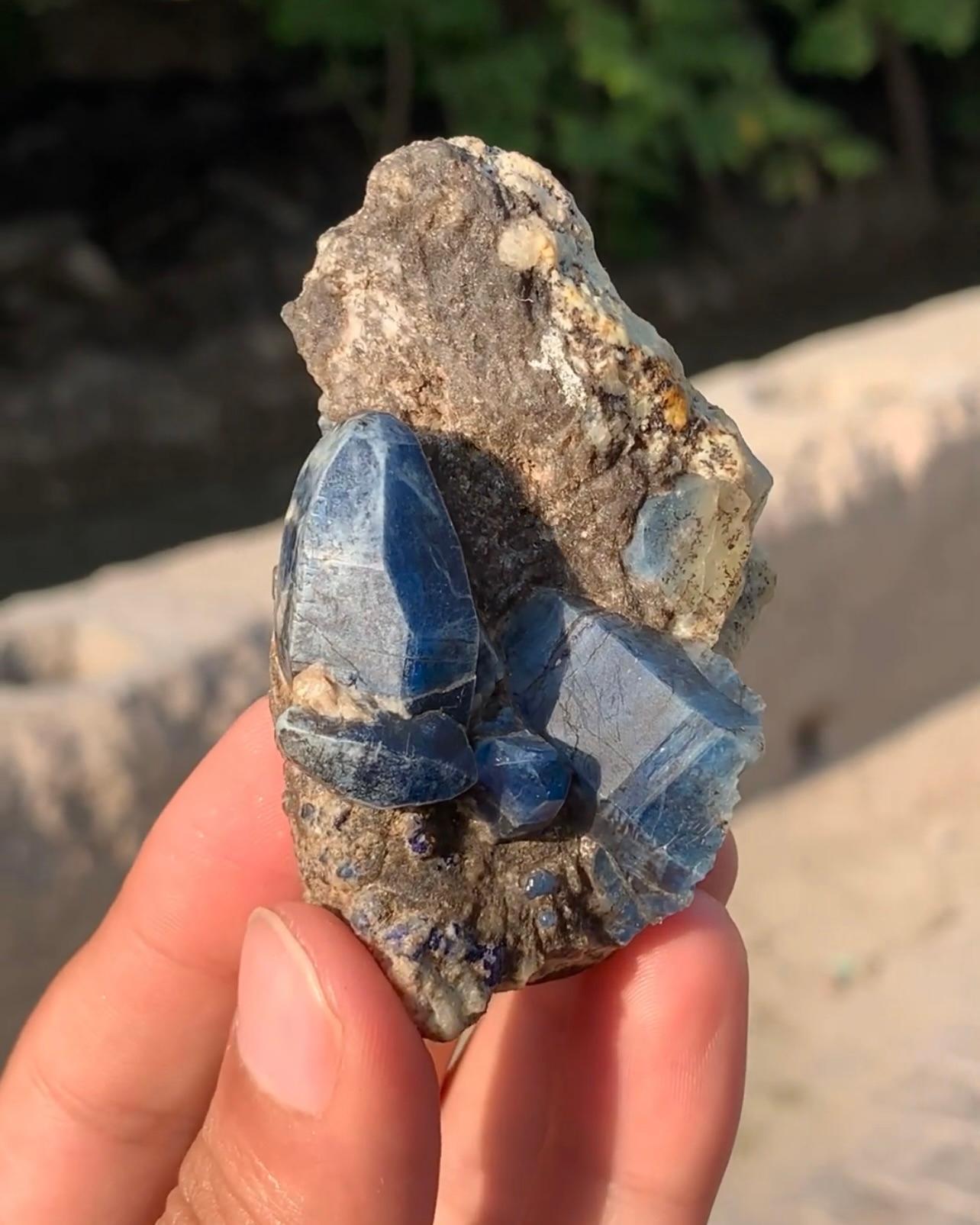 Product Information:

Specimen Type: Afghanite crystals on Calcite
Weight: 2065 grams
Dimension: H: 20 x W: 9.8 x D: 9.5 cm
Origin: Saar-e-Sang Mine, Badakhshan Province, Afghanistan

Description:

The rare elongated vivid blue Afghanite crystals on