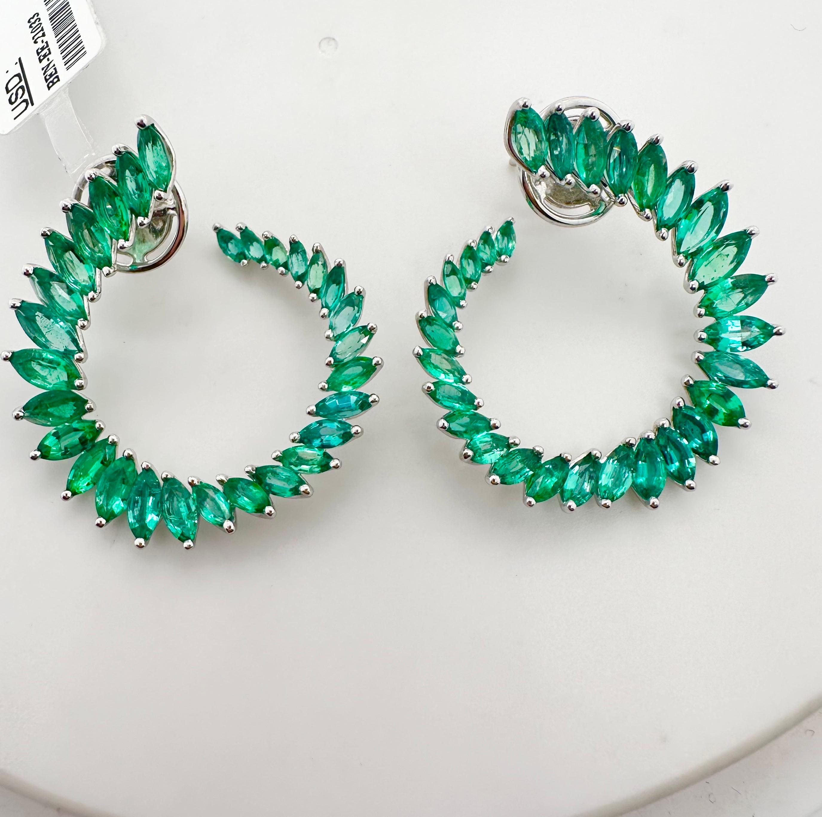 Rare emerald hoop earrings in 18KT white gold, made to perfection with Colombian green emeralds and looks absolutely glamorous and sparkly! Comes with certificate of authenticity for emeralds and the earrings.


ABOUT US
We are a family-owned