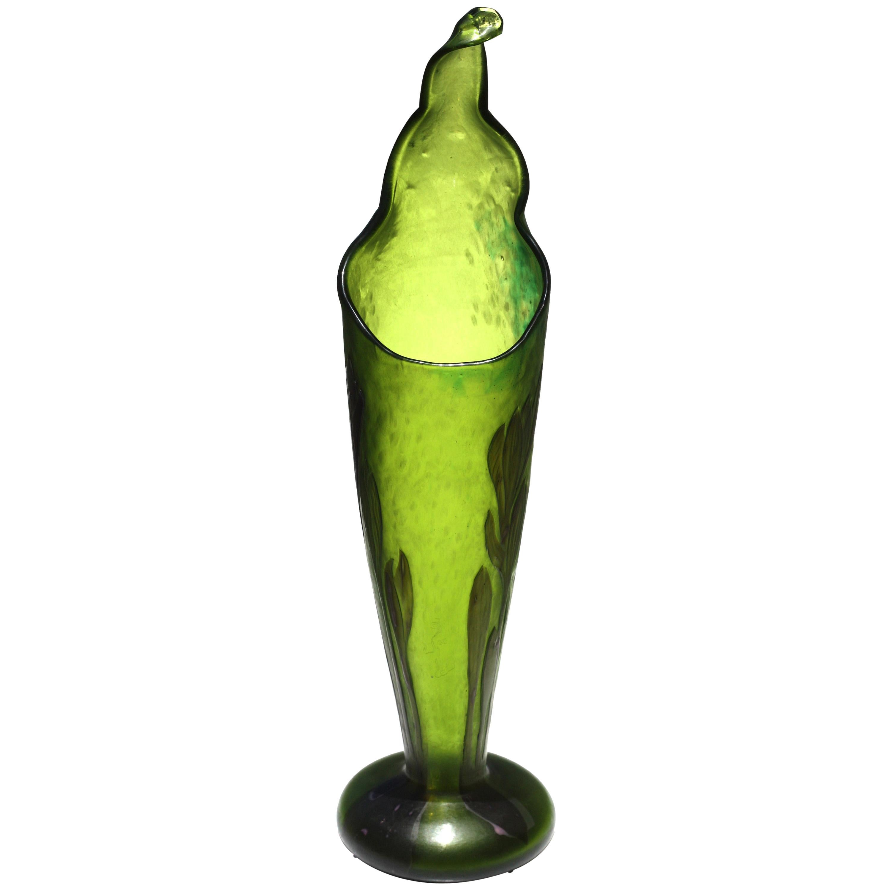 Rare Emile Gallé Crocus Marqueterie-Sur-Verre glass vase, circa 1900, incised Gallé in script on the vessel, the bottle-green tapering vessel with an undulating leaf-shaped opening with an extended upward scrolled flange, on a circular spreading