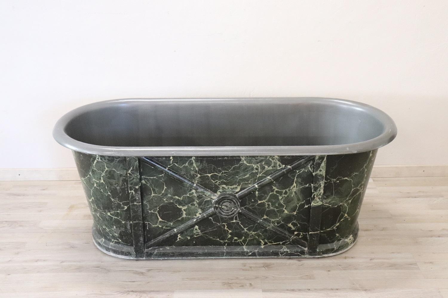 Rare antique bathtub Napoleon's Italian Empire, 1800s in galvanized sheet with hand painted faux marble decorations. The bathtub is presented to you as we found it with all the fascinating signs of the time. This item is really special and rare