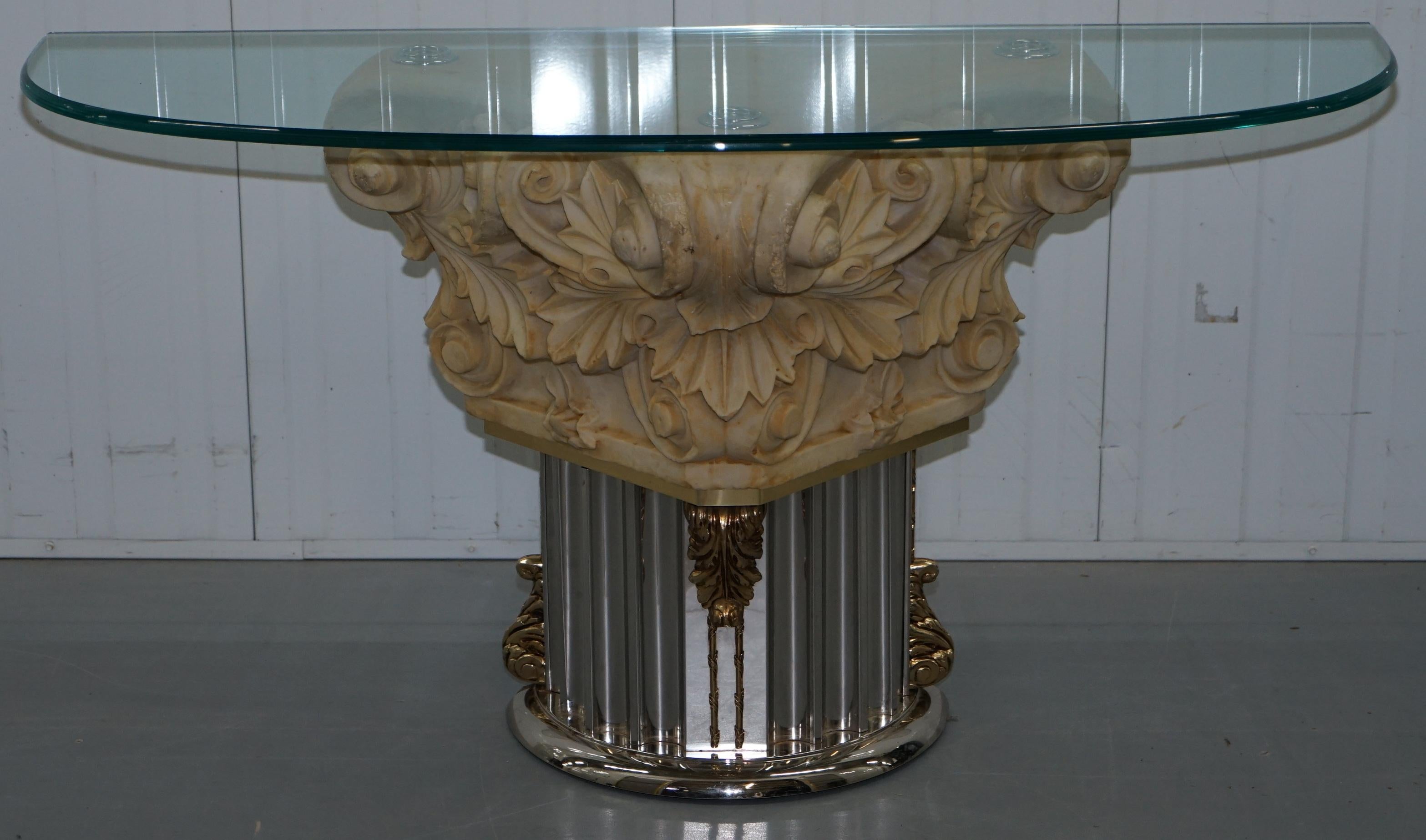 We are delighted to offer for sale this very rare Empire Corinthian pillar console table base with thick glass top

A very heavy and substantial piece, I’m not sure what the base is made of by it weighs a tonne, naturally modelled on a Roman