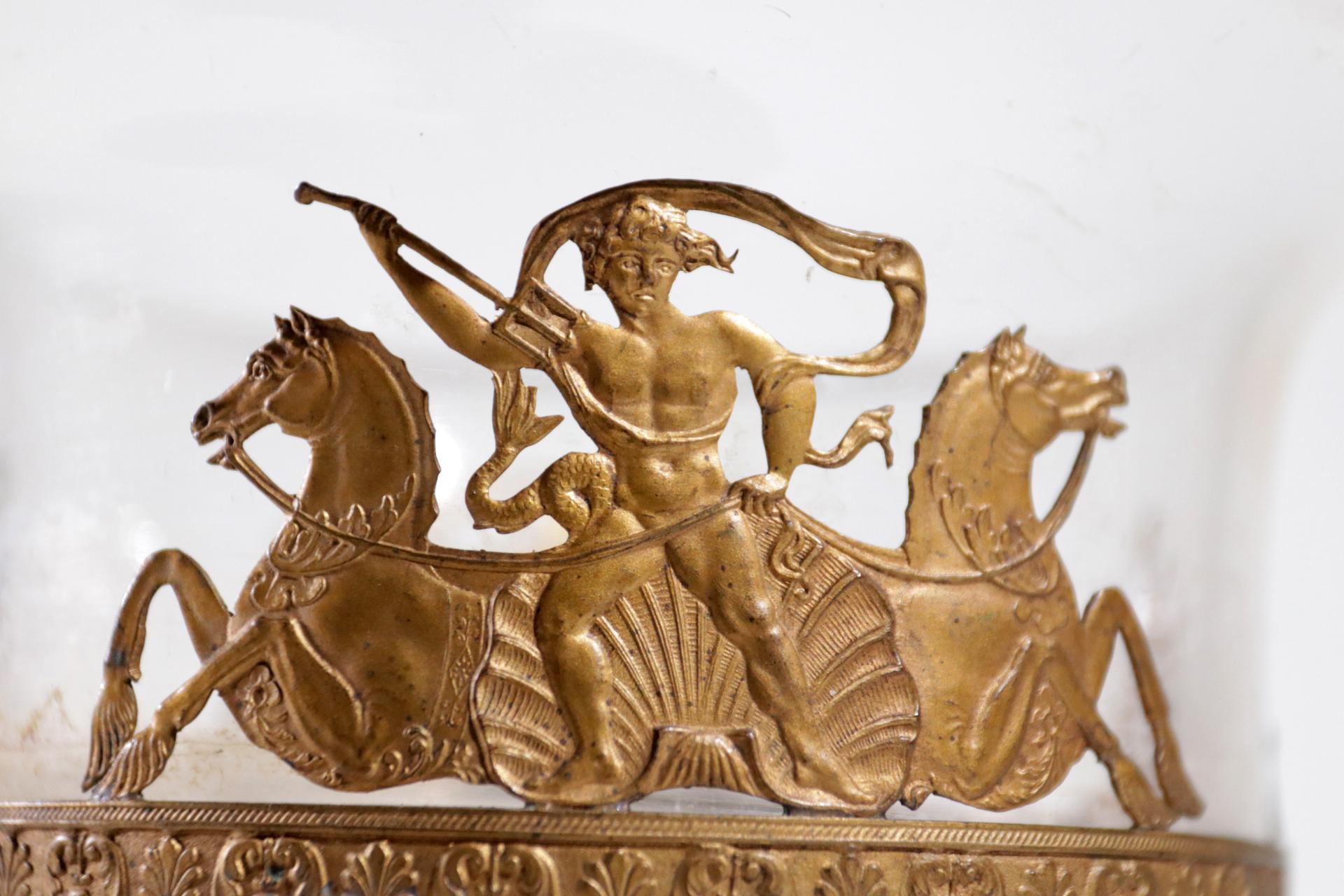 More than 200 years old showpiece for on the table. Made from glass, fire-gilt bronze and green veined marble. Beautiful horses with a warrior and mythological figures with harp and triangle around the glass bowl on columns. The glass is old and