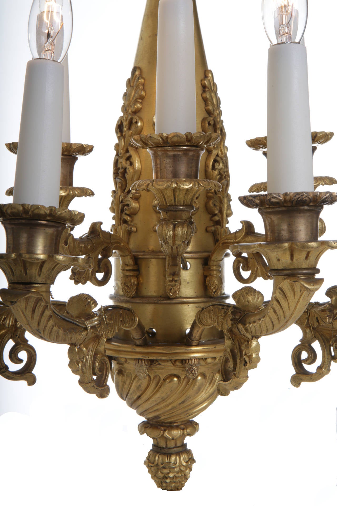 A rare pair of Charles X ormolu bronze seven branch wall lights in the Empire Revival style. Exclusive mercury gilding and lately electrified.