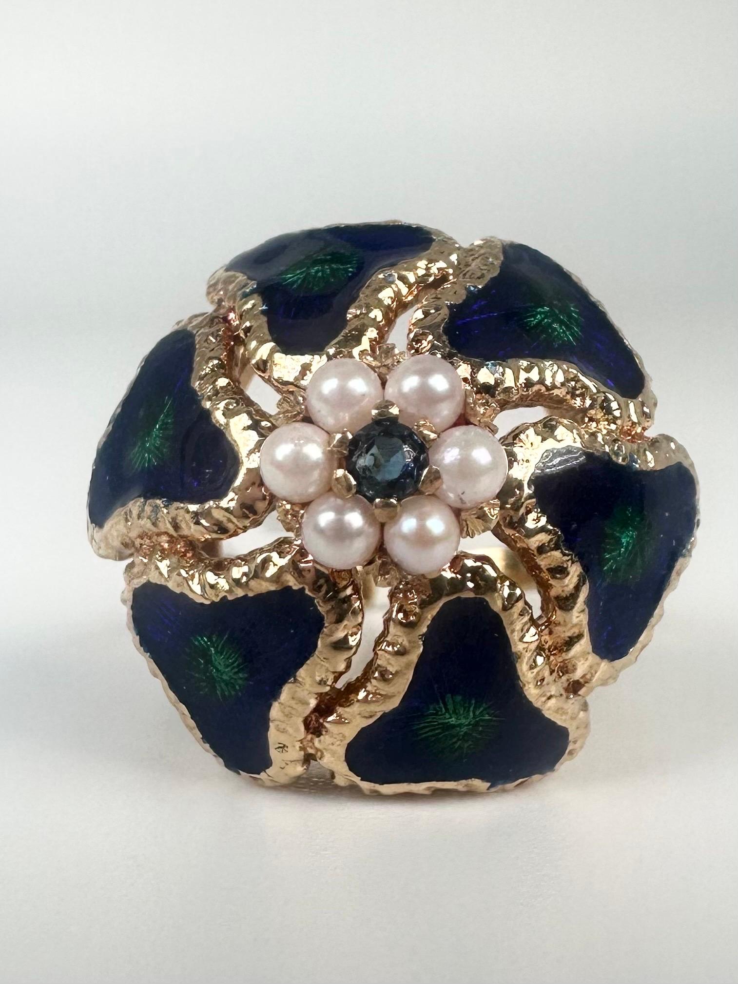 An art creation, a rare enamel work combining green and blue colors, stunning center sapphire and pearl halo in 14KT yellow gold. This ring is earthy with lots of meaning if you look at the ring you can feel so many emotions of our mother earth of