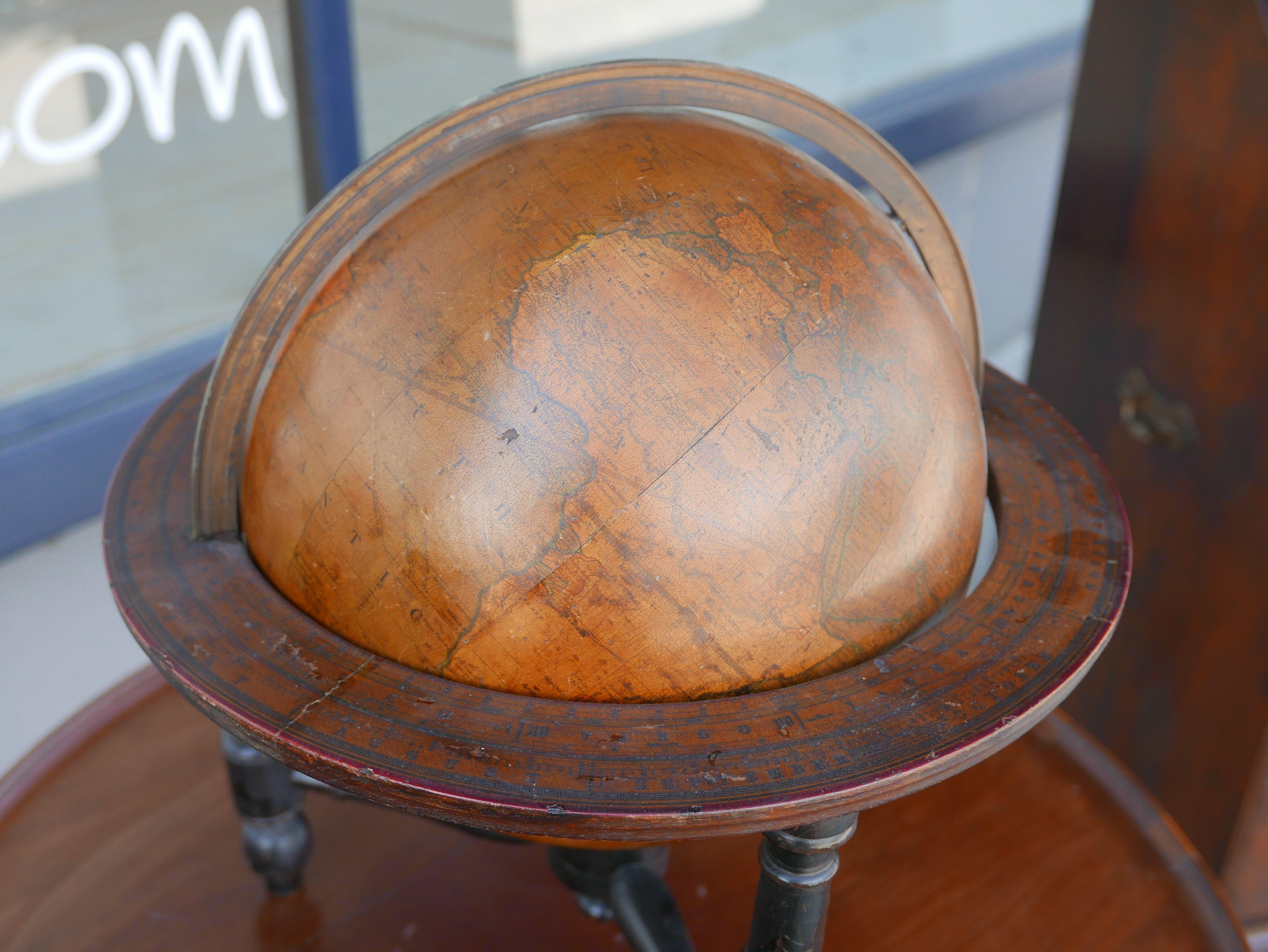 The new 12 inch British terrestrial globe representing the accurate positions of the principal known places of the earth from the discoveries of Captain Cook and subsequent circumnavigators to the present period 1802 with Additions to 1807 with