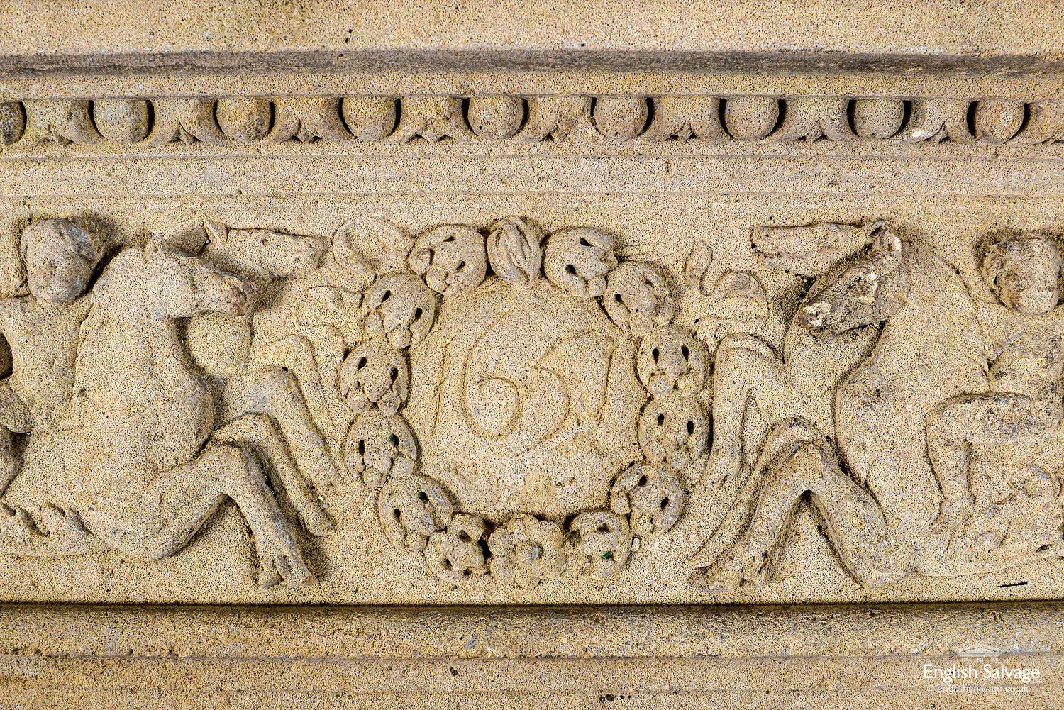 An extremely rare example of an English mid-17th century hand carved limestone fire surround dated '1651', from the rule of the Commonwealth, under Oliver Cromwell. We purchased this fire surround in North Wales, it had been covered in several