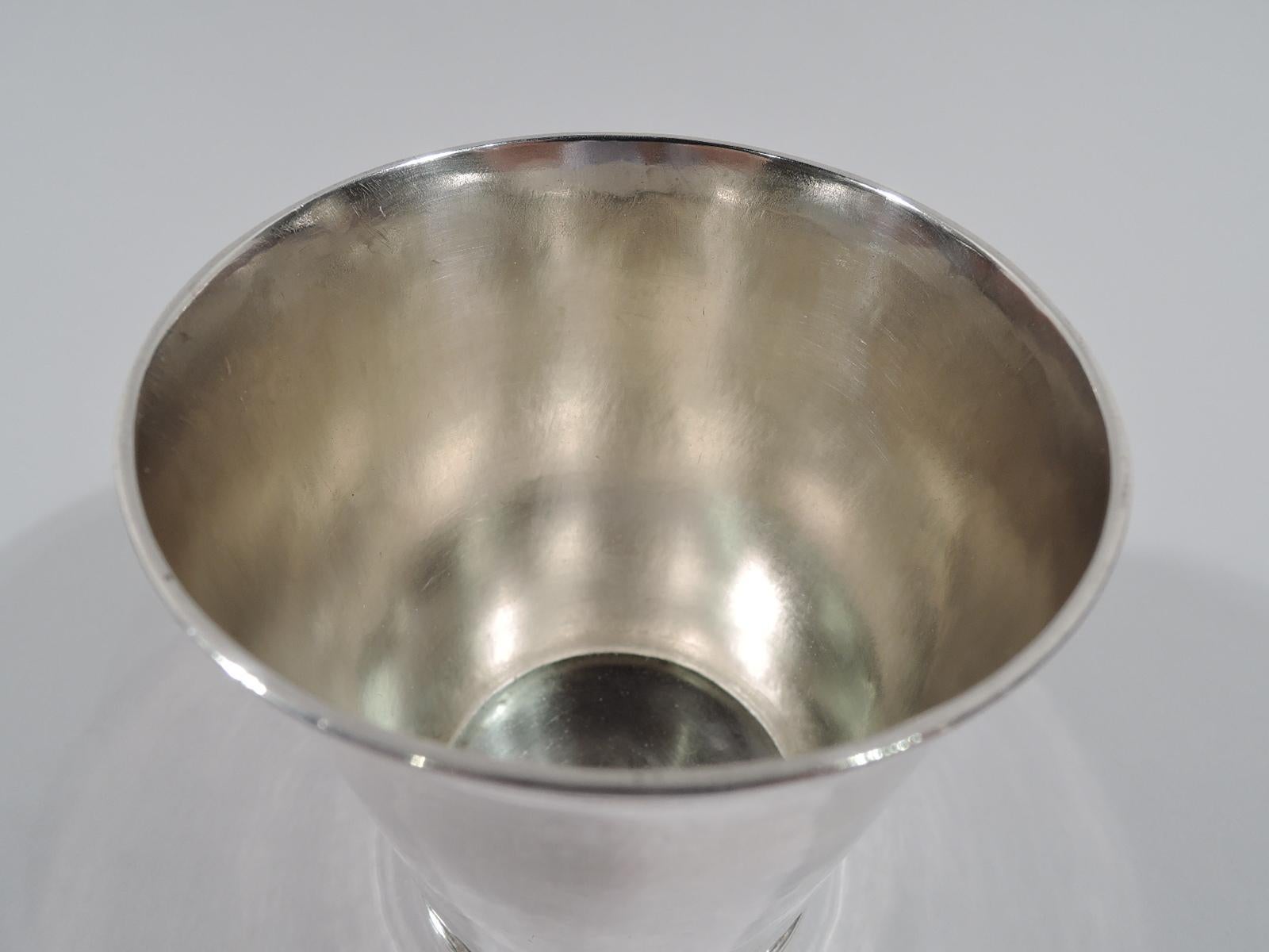 Rare Charles II sterling silver beaker, 1667. Tapering sides with flared rim and reeded foot. Block letter E engraved on underside. Fully marked including London assay stamp and maker’s initials WS (possibly William Scarlett). Weight: 4.4 troy