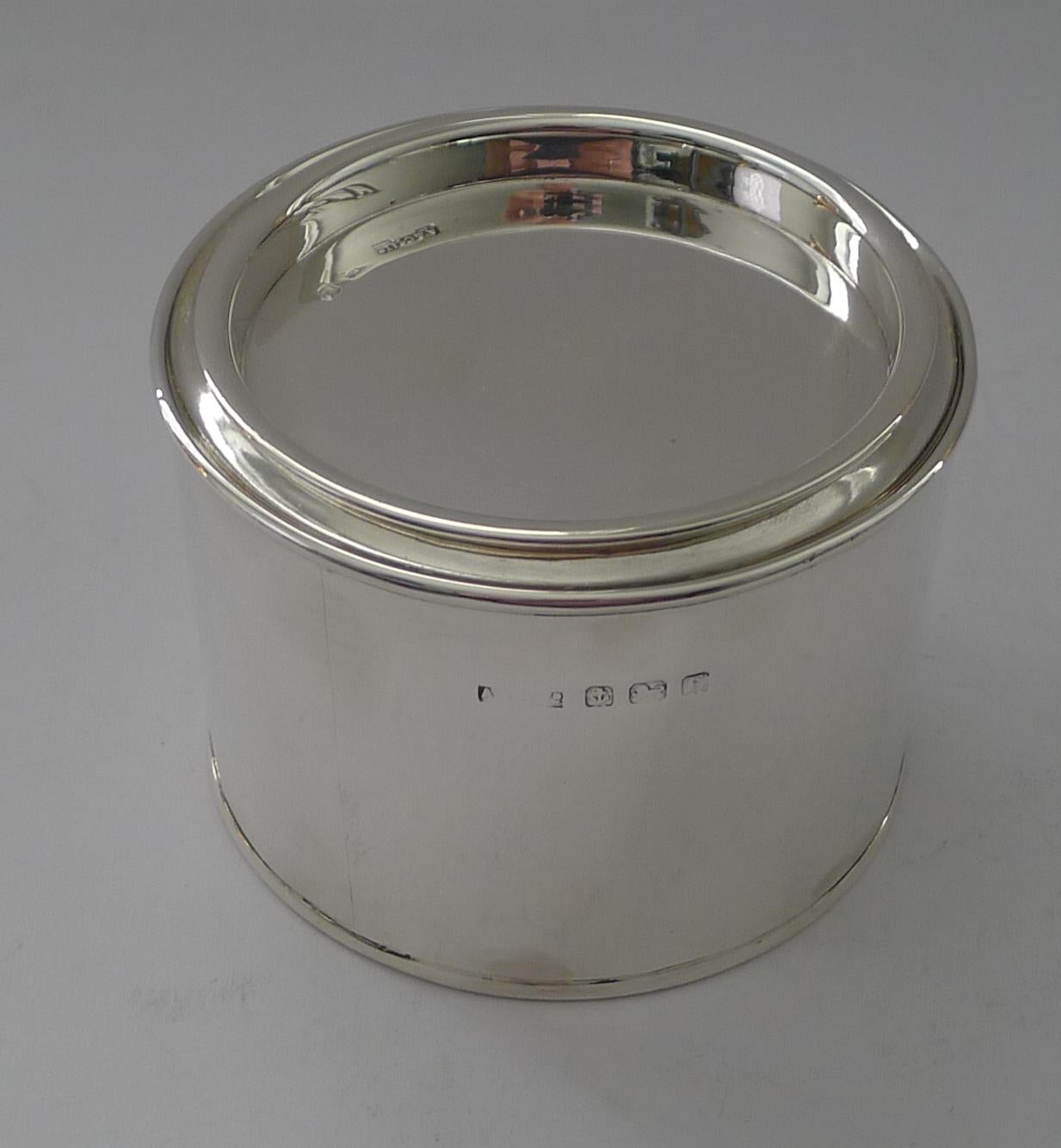 These novelty solid sterling silver boxes or Canisters are always highly sought-after in the form of a paint tin with a lift off lid.

This one is made by the creme de la creme of silversmiths, Asprey of Bond Street, London fully marked.  The full