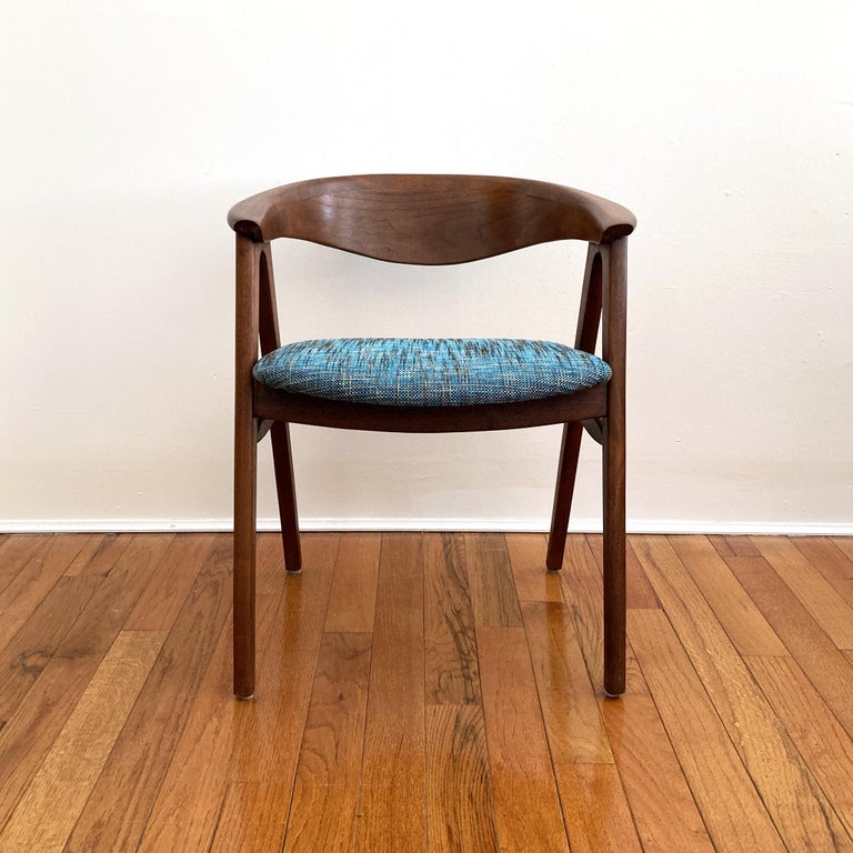 Stunning walnut Model 52 chair by Erik Kirkegaard for Høng Stolefabrik. Reupholstered seat in blue tweed.

Measurements:
W: 22 1/2