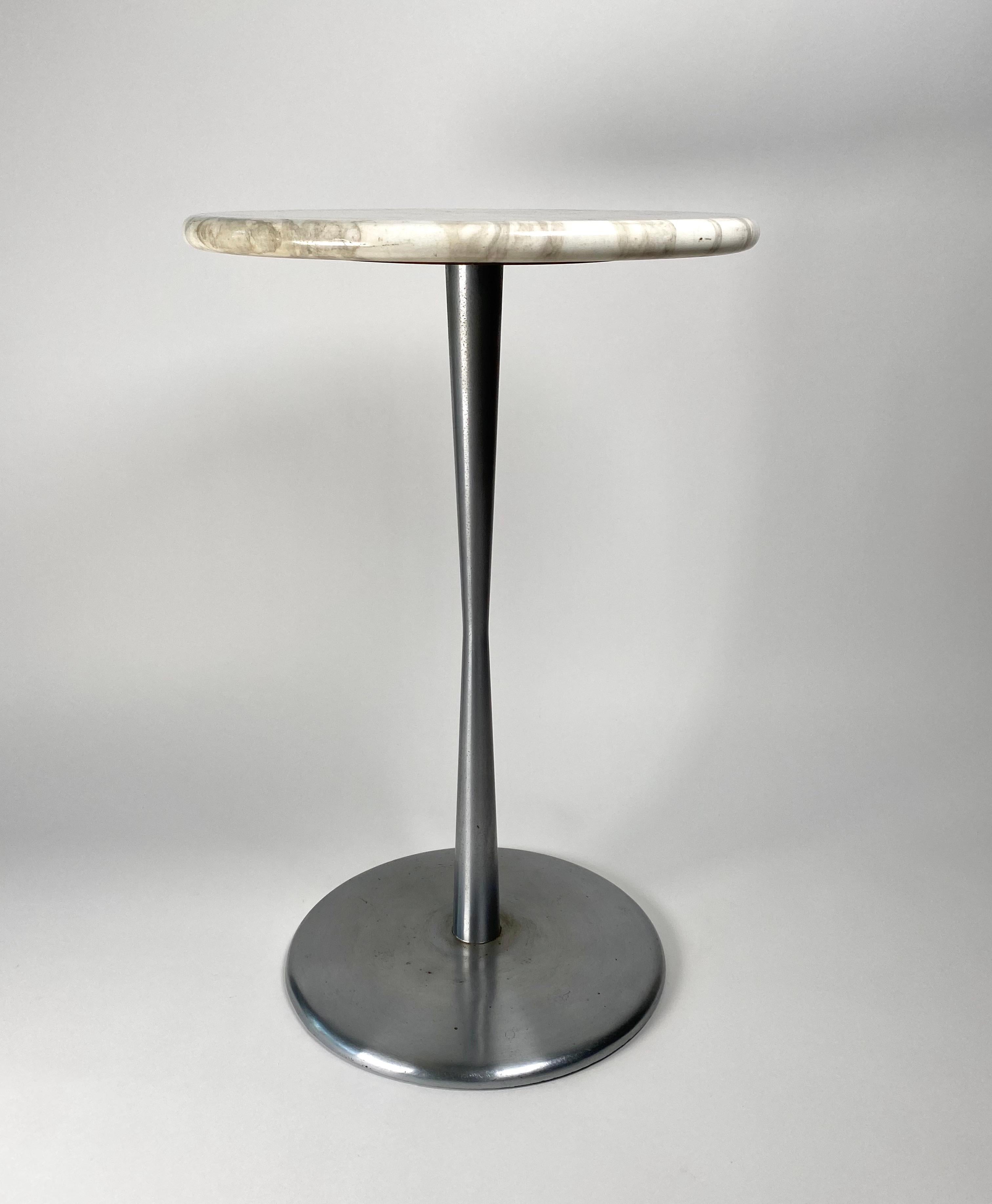 A one of a kind side table by the design duo Erwine and Estelle Laverne for their company Laverne Originals of New York. This belonged to a New York Interior Designer and was in her apartment during the early 1960s and was also part of an interior
