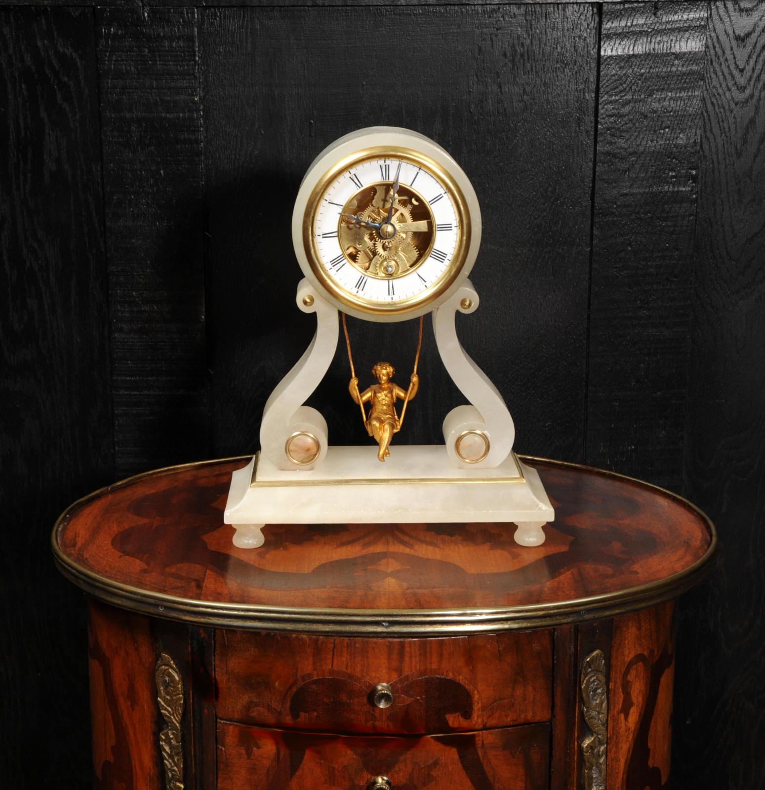 A super, rare original antique French clock featuring a maiden swinging back and forth as the pendulum. This is the Farcot version, the best one, patented by Farcot in 1862. It uses a double escapement with a half moon pallet to achieve the front to