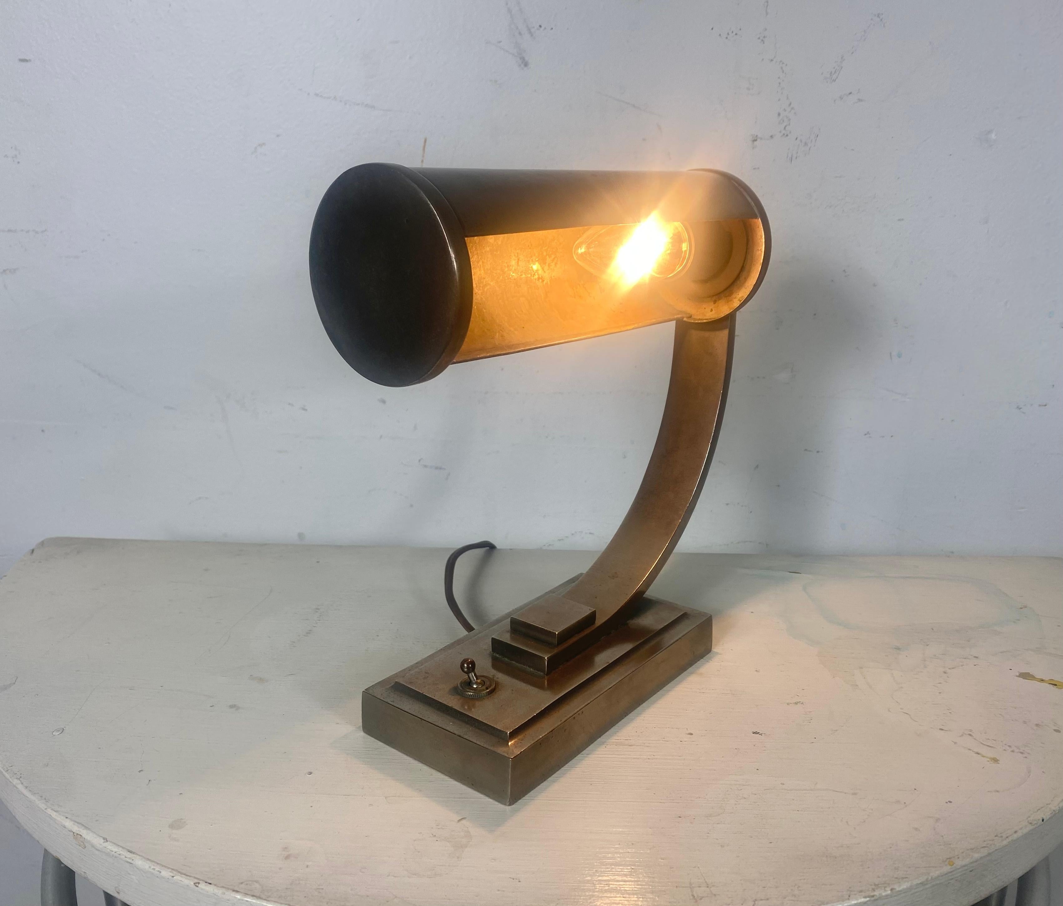 Extremely rare example. Classic Bauhaus / Deco desk lamp designed by Gilbert Rohde. Retains original brushed nickel finish. Patina, also original on/0ff switch, Lamp has been re-wired, tested and working perfectly.