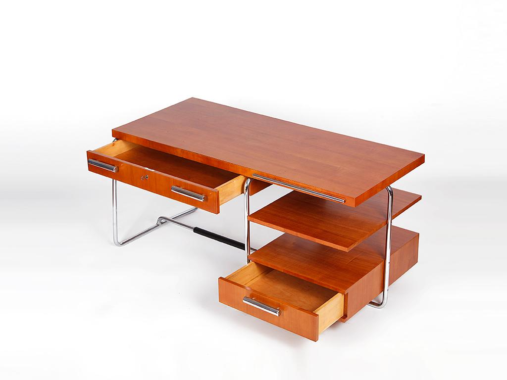 Rare Executive Tubular Steel Desk by Mücke-Melder, 1930s
An exceptional and rare example of early Czech Modernism, this substantial executive desk was crafted in the 1930s by Mücke-Melder a renowned manufacturer known for producing pieces for