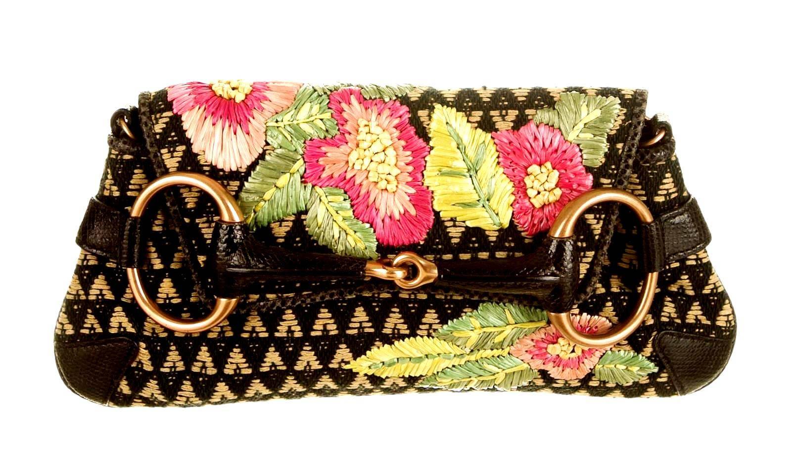 Stunning GUCCI signature horsebit flap bag
Amazing piece of work - handwoven raffia with floral embroidery
Black real exotic skin trimming - no print
Matt gold hardware
Fully lined with aqua-colored fabric
Single slit pocket inside
Removable