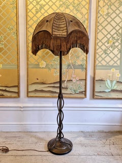 Rare exquisite bronze floor lamp with entwined snakes, early 1900s.