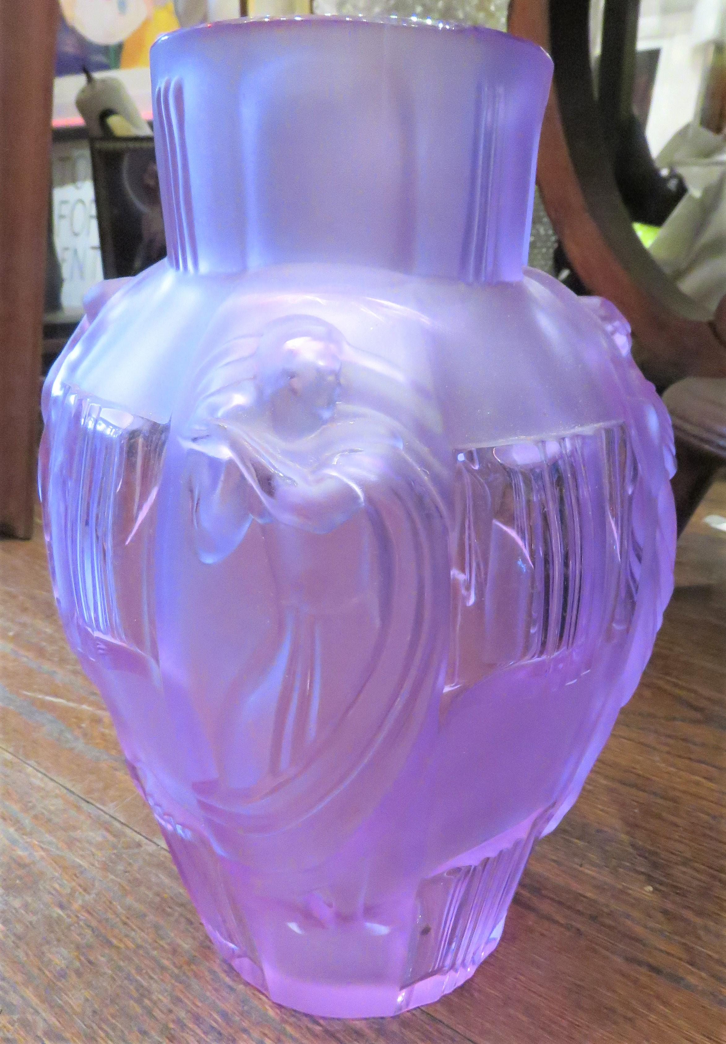 The Following Item we are offering is a Beautiful Czechoslovakian Amethyst Colored Four Seasons Frosted Glass Vase of Round Oval Form decorated with Four Beautiful Women Adorned on all sides representing the Four Seasons. A Rare Outstanding
