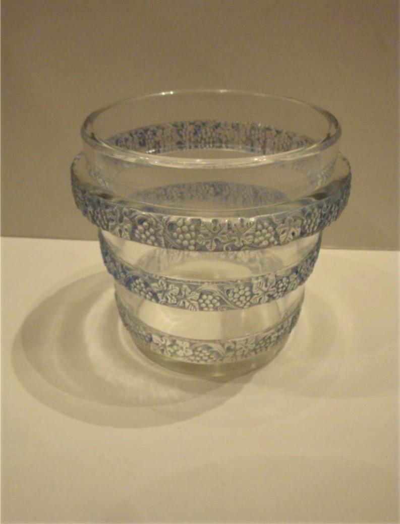 The Following Item we are offering is an Estate R. Lalique Blue and White Tiered Vase with Grape Clusters on Each Tier conjoined with swags of garland, signed in Block letter 