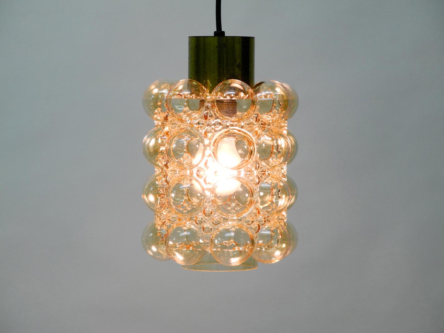 Big and heavy original brass glass bubble pendant lamp from the 1960s.
Manufactured by Limburg, design by Helena Tynell.
Very good vintage condition with little signs of wear and fully functional.
100% original condition without damage and fully