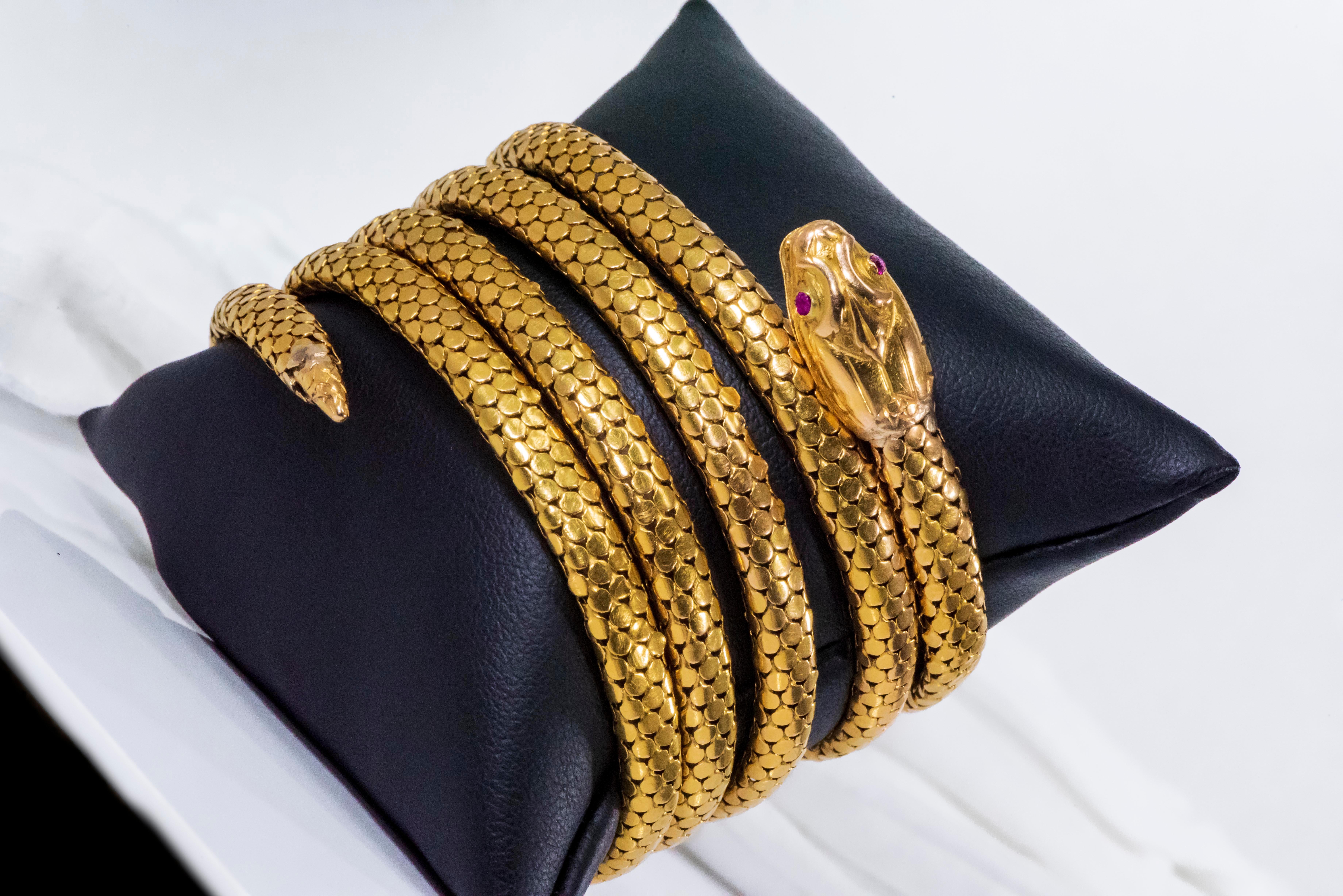 The present bracelet is a very rare variation of the popular design for this period. During this time frame, snake bangle bracelets were designed using a unique coiling system which allowed them to be flexibly worn on the wrist. There were different