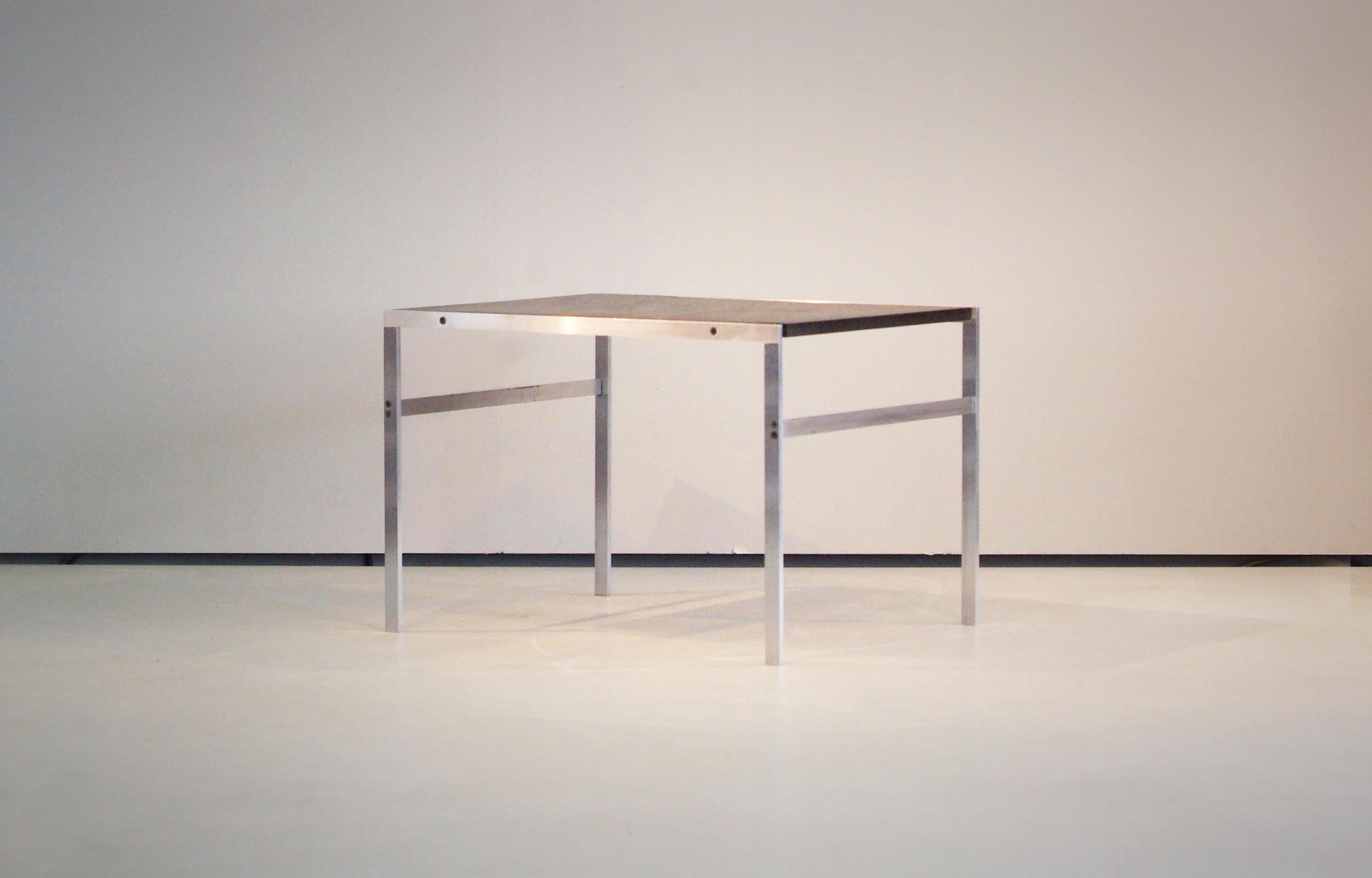 Rare Fabricius & Kastholm side / coffee table made by Bo-Ex Denmark in the 1960s. Original structured black slate top and a matte chromed flat steel base.

Great original condition with only minor wear due to age.