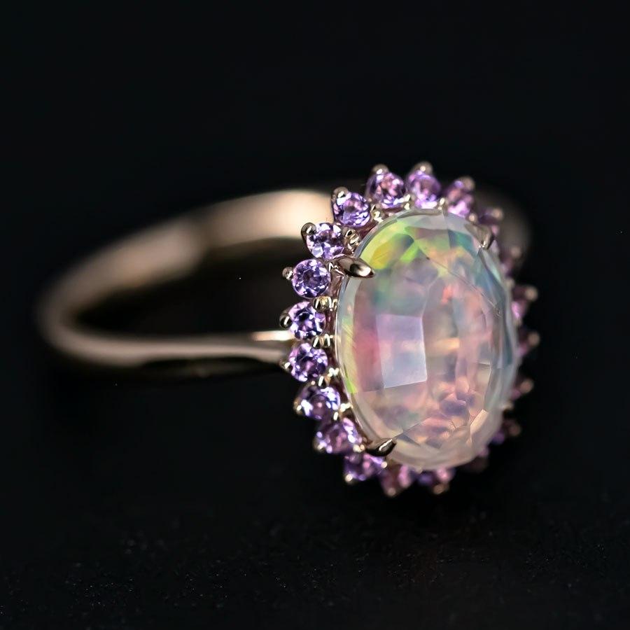 

Rare Faceted Mexican Fire Opal Amethyst Engagement Halo Ring 18K Yellow Gold.


The faceted fire opal is exceptionally rare and stunning!  And please note that a slight hairline is visible in the third picture.

Free Domestic USPS First Class