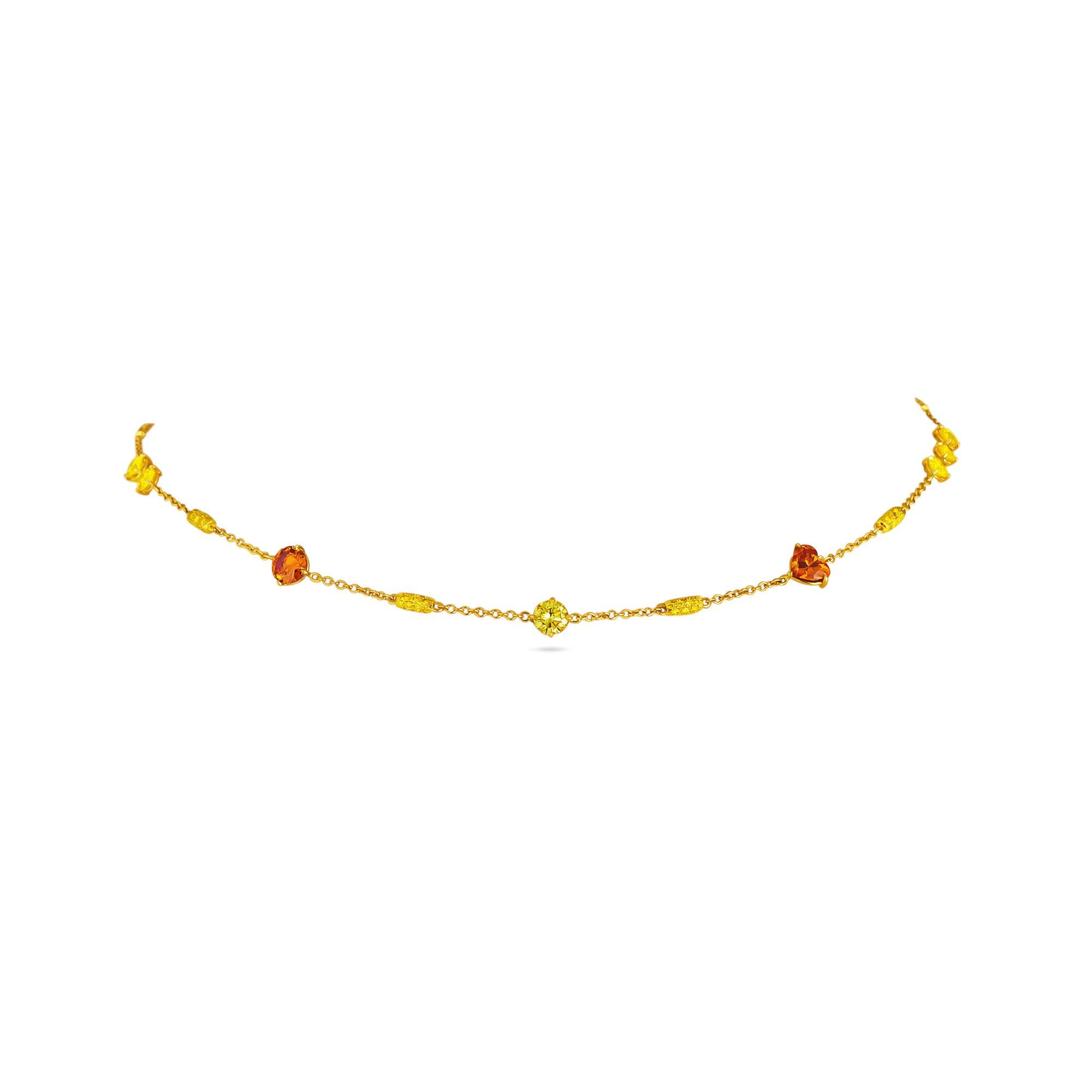 A collection of rare fancy shape natural orange and yellow diamonds dance gracefully together creating a one-of-a-kind necklace that is a musical masterpiece.  Designed and handmade by Steven Fox, this 18 karat gold necklace features one heart
